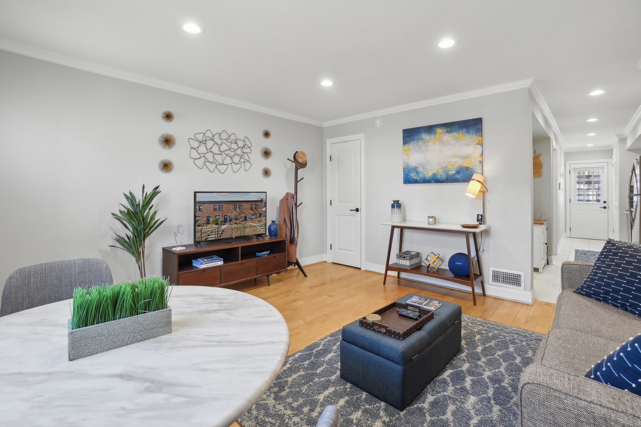 123 17th Street Southeast Washington, DC 20003 - Photo 6 of 18 a living room with furniture and a fireplace