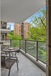 a view of a chairs and table in the room