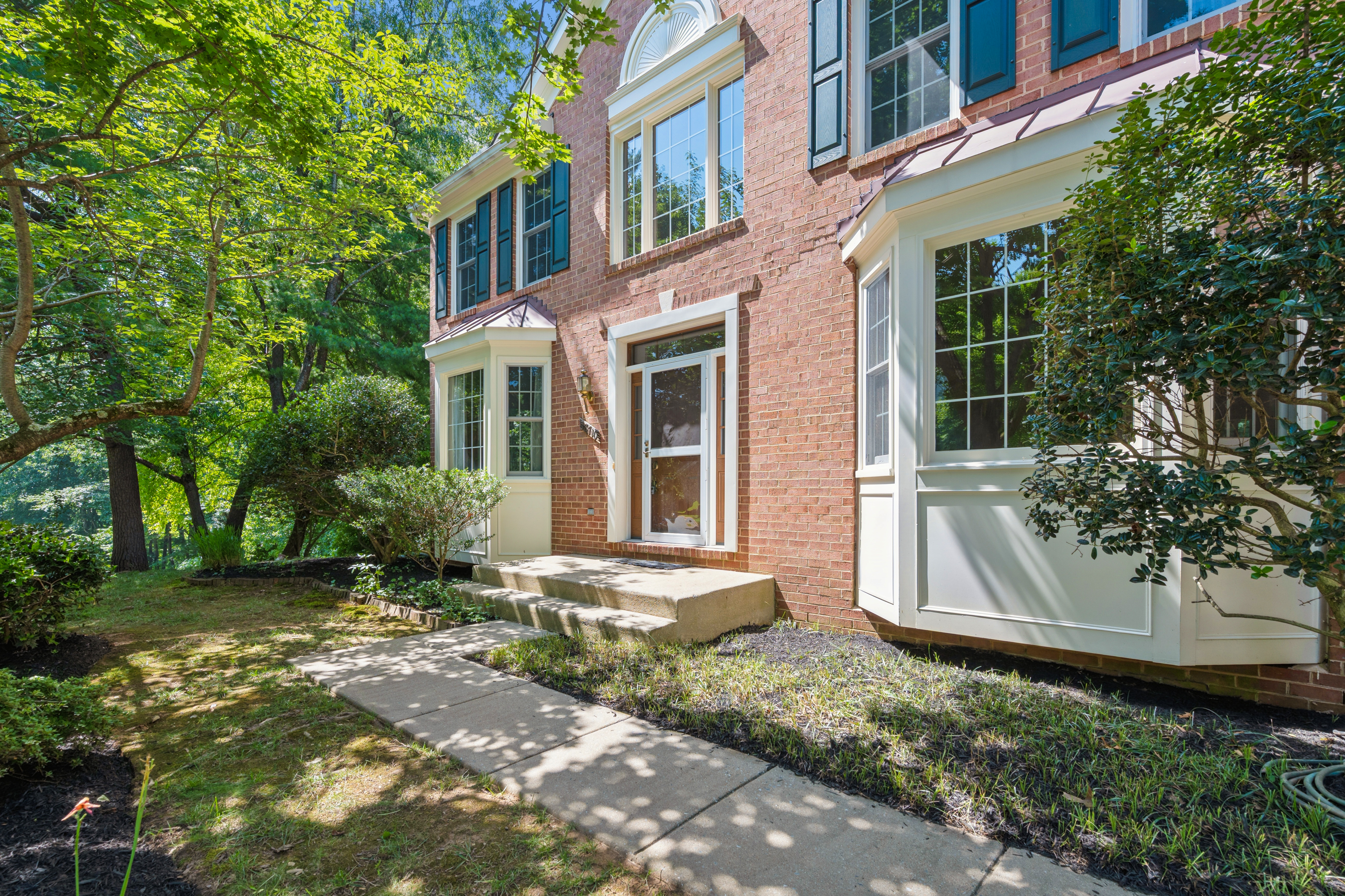 18710 Severn Road Gaithersburg, MD 20879 - Photo 4 of 96 a front view of a house with a yard