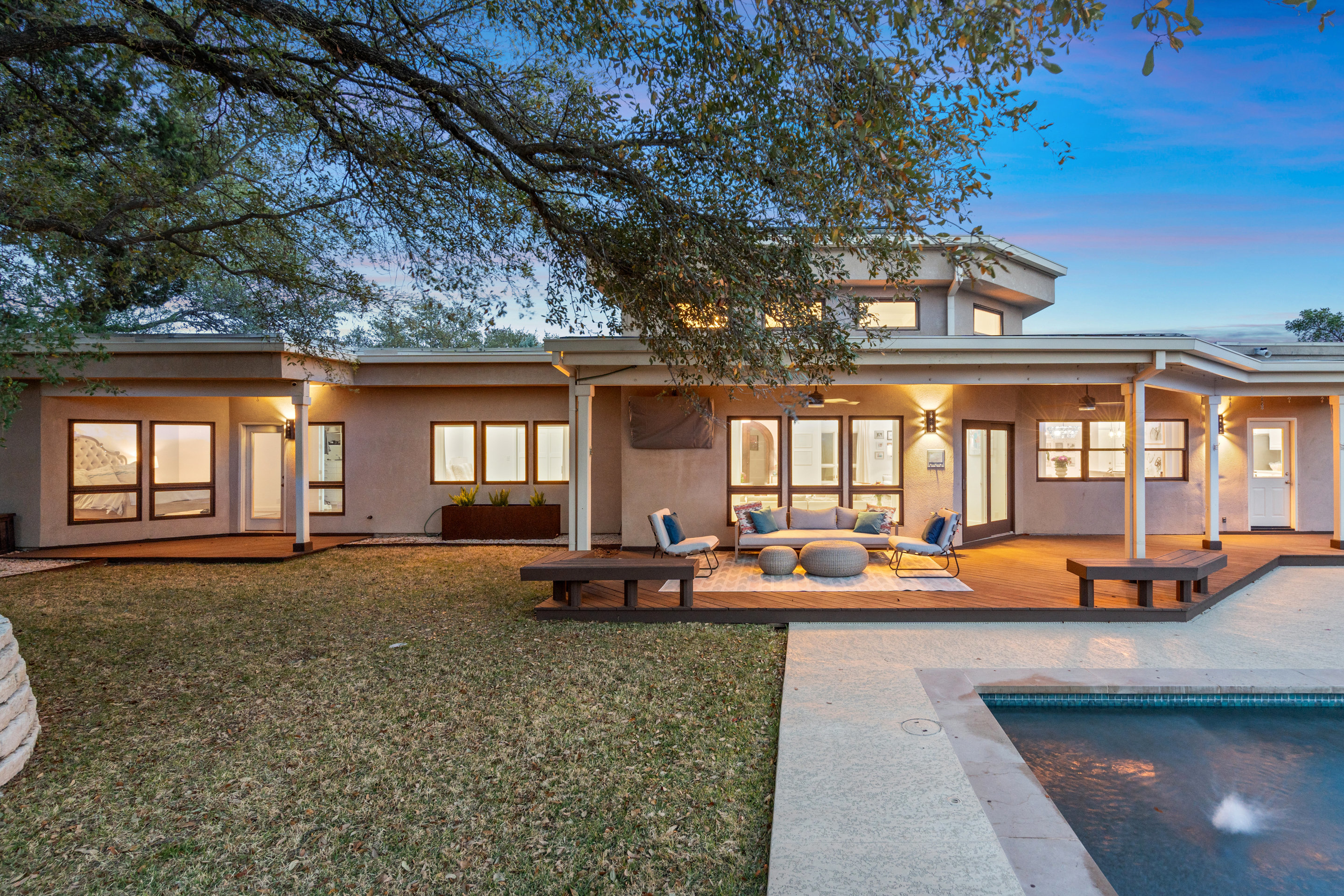 5319 Backtrail Drive Austin, TX 78731 - Photo 35 of 35 an outdoor space with patio furniture and a fireplace