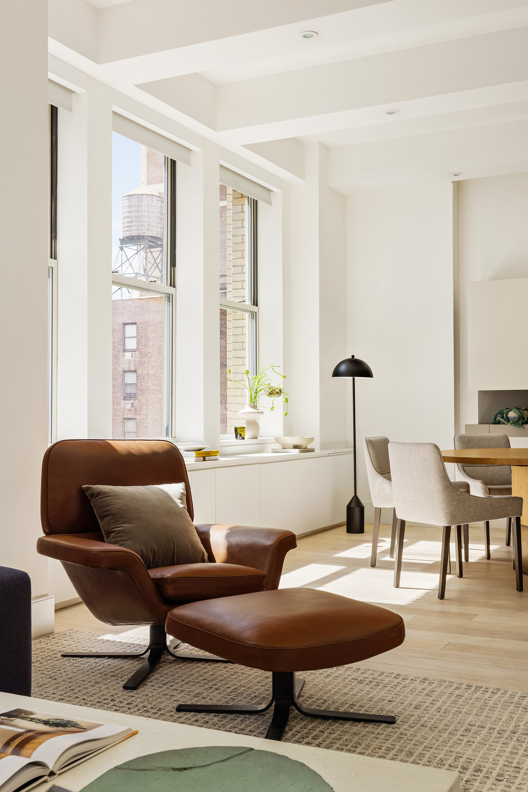 49 East 21st Street, Unit 9A Manhattan, NY 10010 - Photo 7 of 18 a living room with furniture and a window