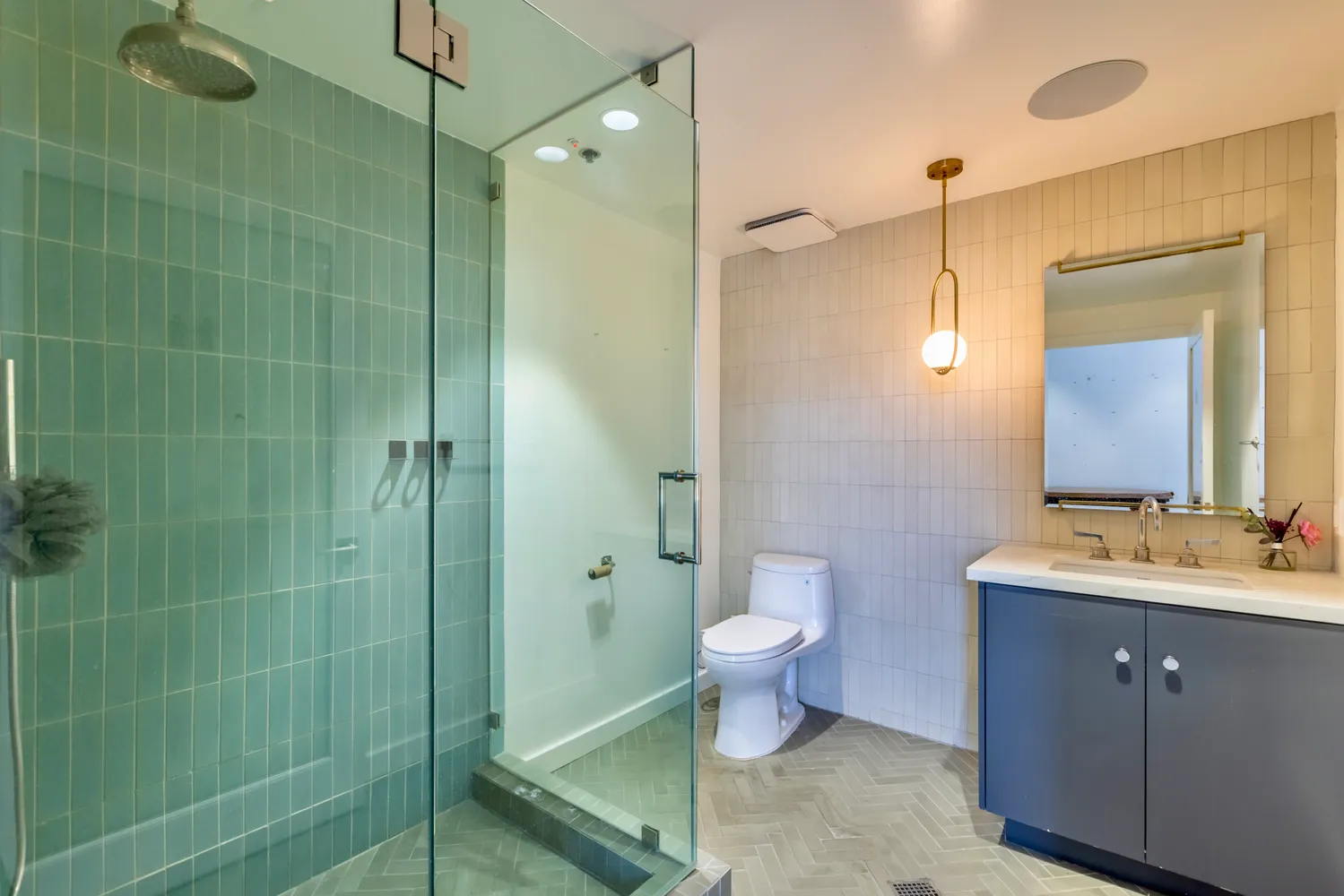 a room with wooden floor and pool table