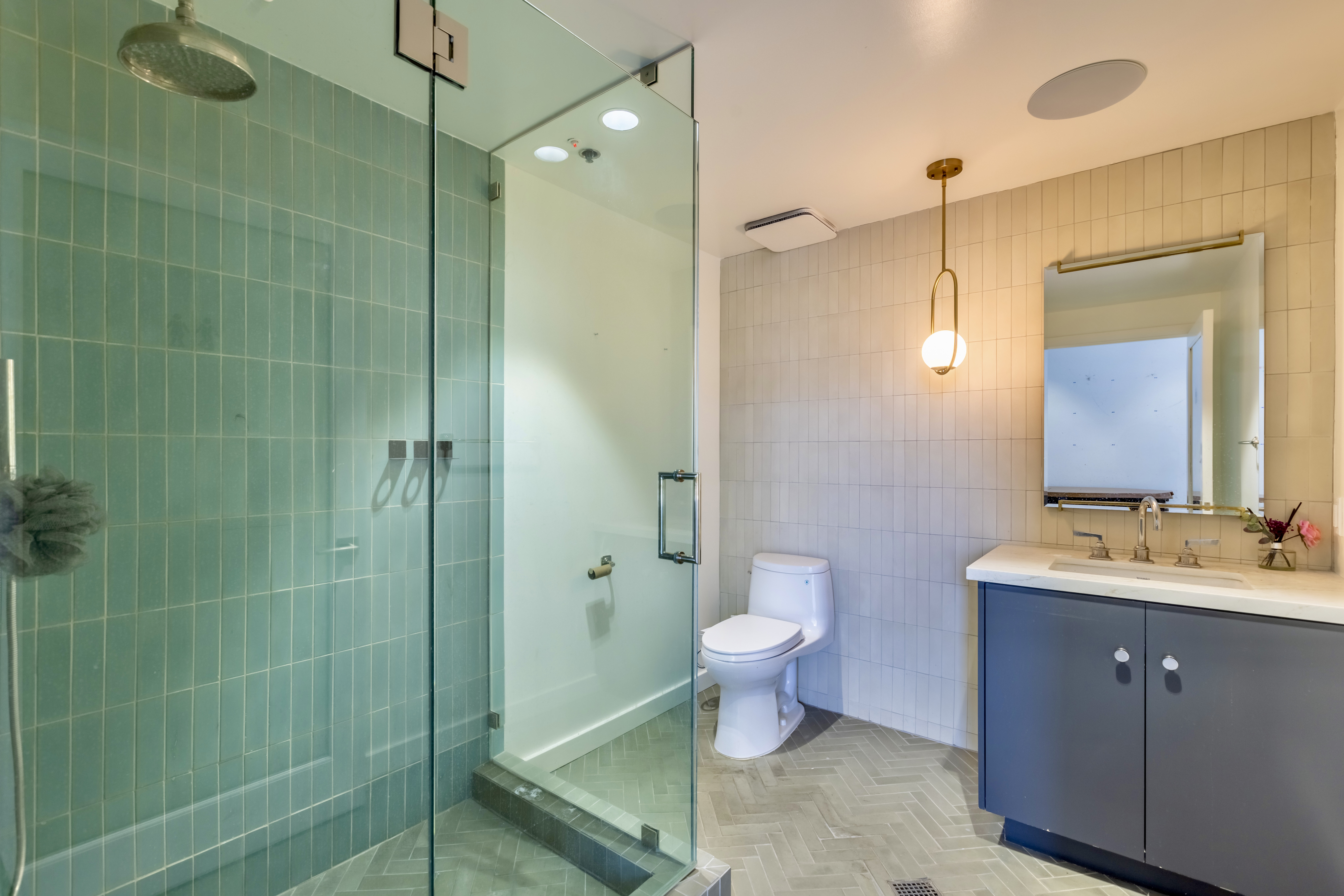 3058 North Lima Street Burbank, CA 91504 - Photo 13 of 41 a bathroom with a double vanity sink toilet and shower