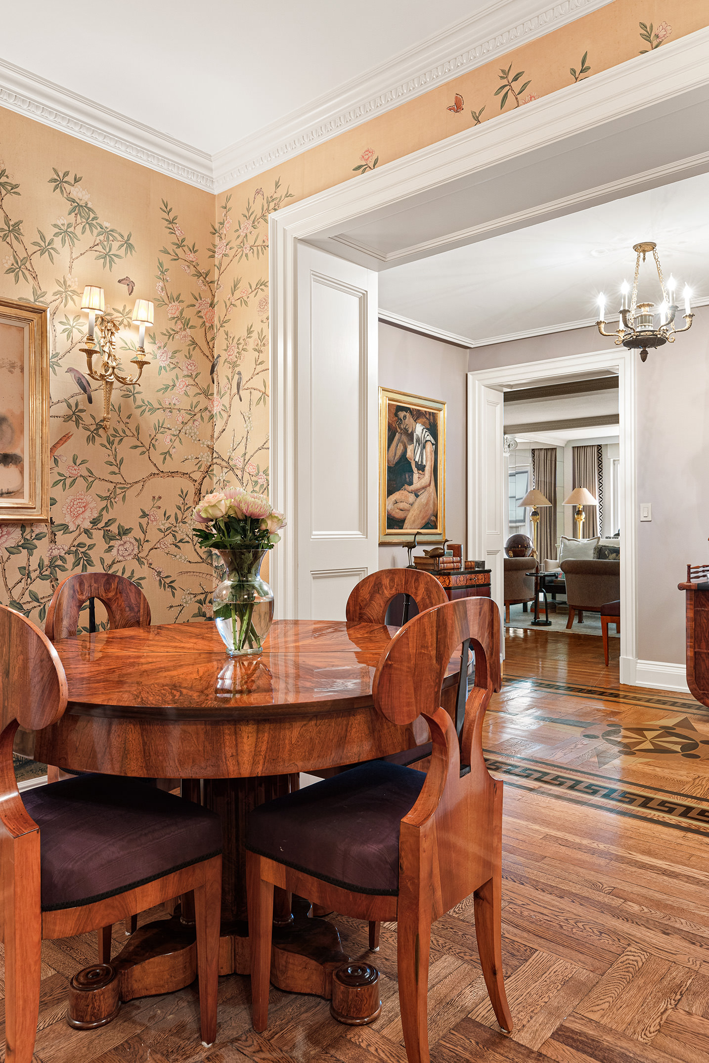 930 5th Avenue, Unit 11D Manhattan, NY 10021 - Photo 5 of 11 a view of a dining room with furniture and wooden floor