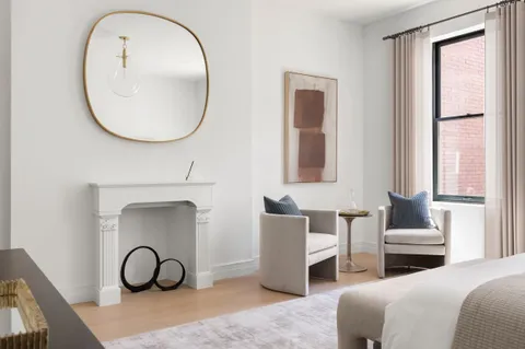 a view of a livingroom with furniture