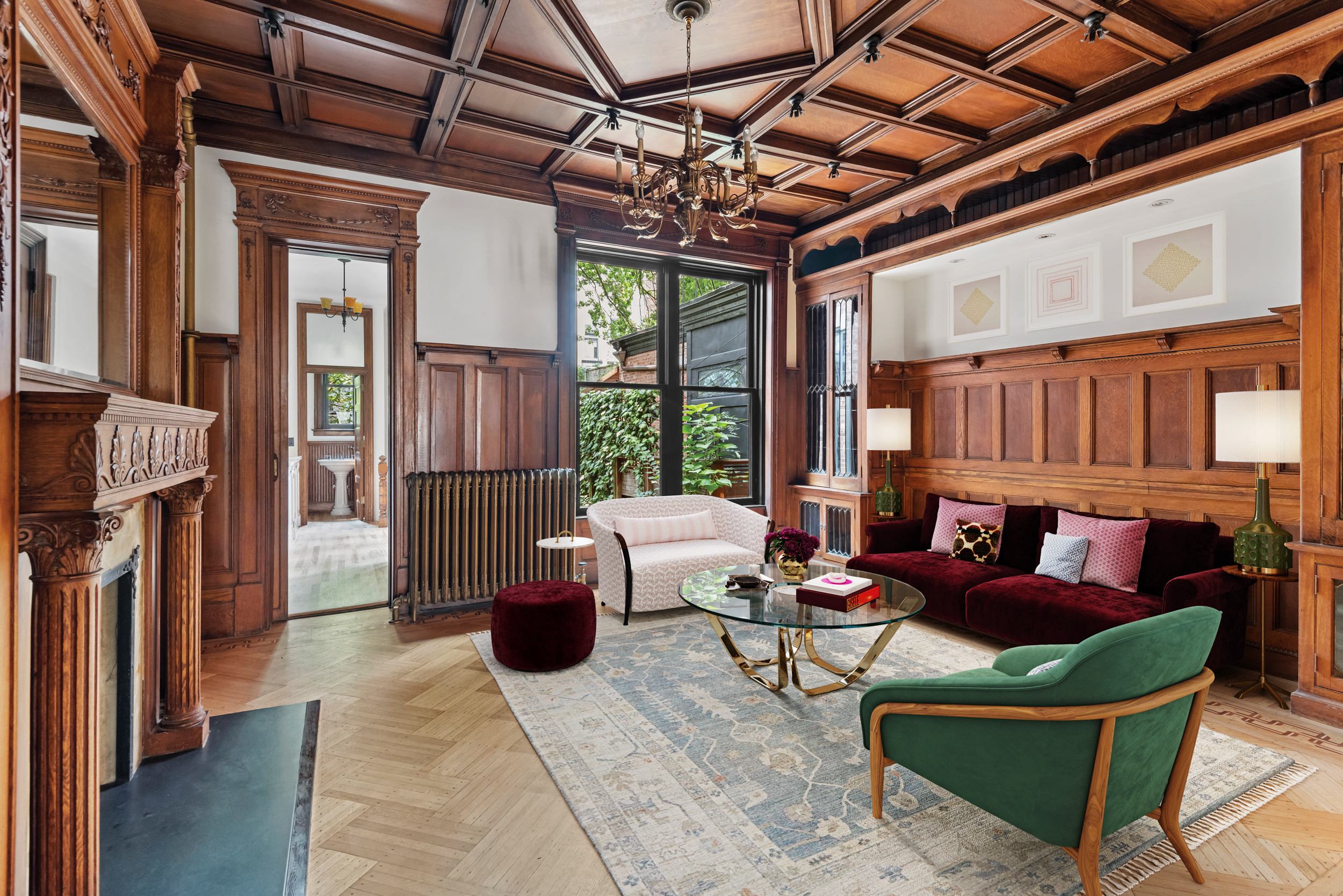 616 2nd Street Brooklyn, NY 11215 - Photo 2 of 19 a living room with furniture a fireplace and a window