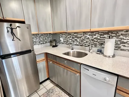 a kitchen with a stove and a microwave