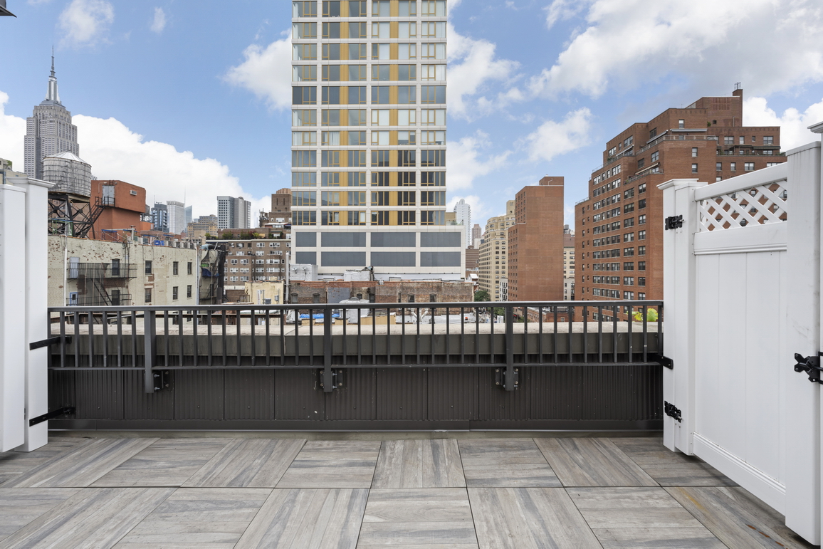 160 East 26th Street, Unit 6B Manhattan, NY 10010 - Photo 9 of 10 a view of a balcony with city view