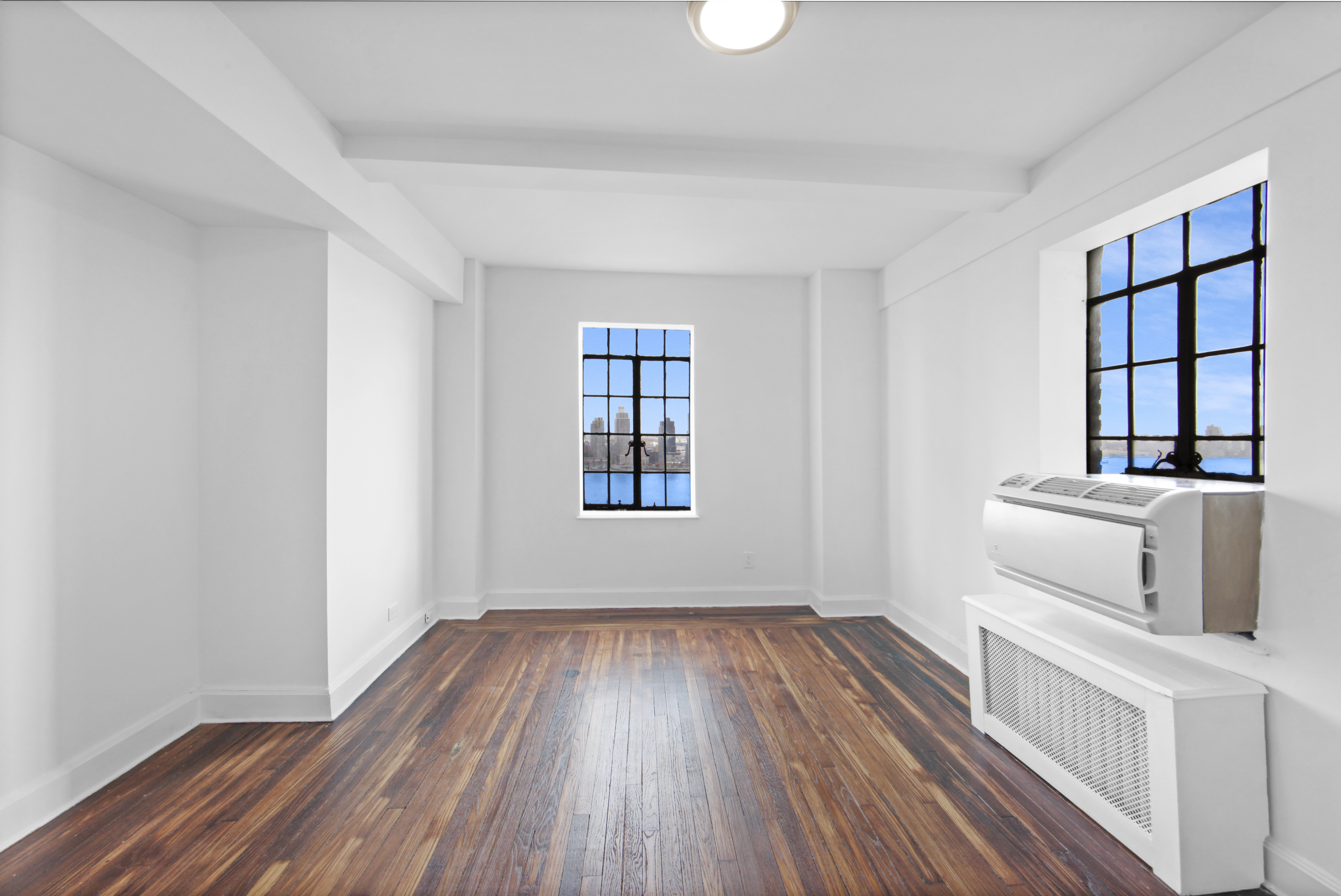 5 Tudor City Place, Unit 1536 Manhattan, NY 10017 - Photo 13 of 21 a room with storage and utility