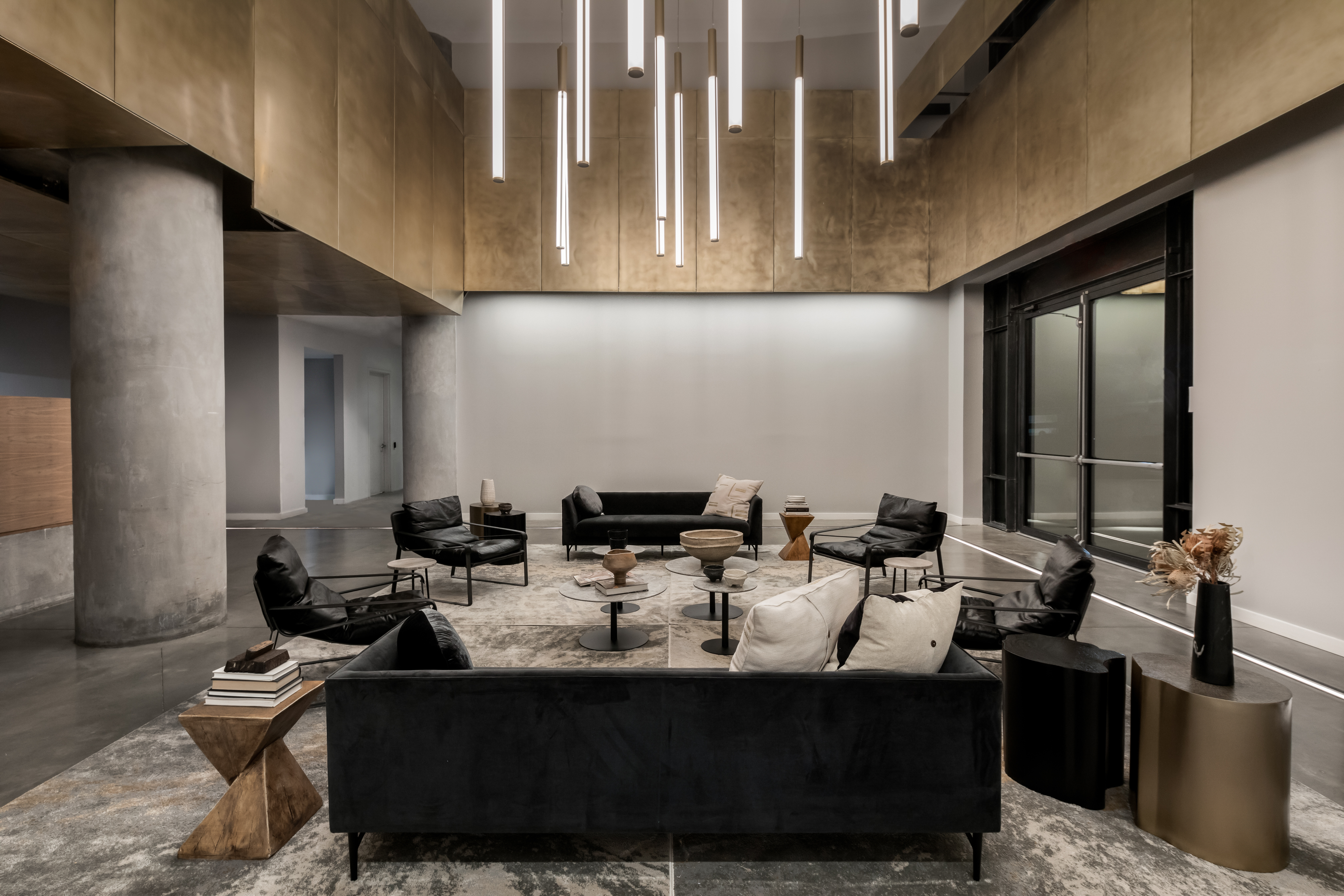 160 Imlay Street, Unit 5A2 Brooklyn, NY 11231 - Photo 12 of 14 a group of people sitting on a bench in lobby of a building