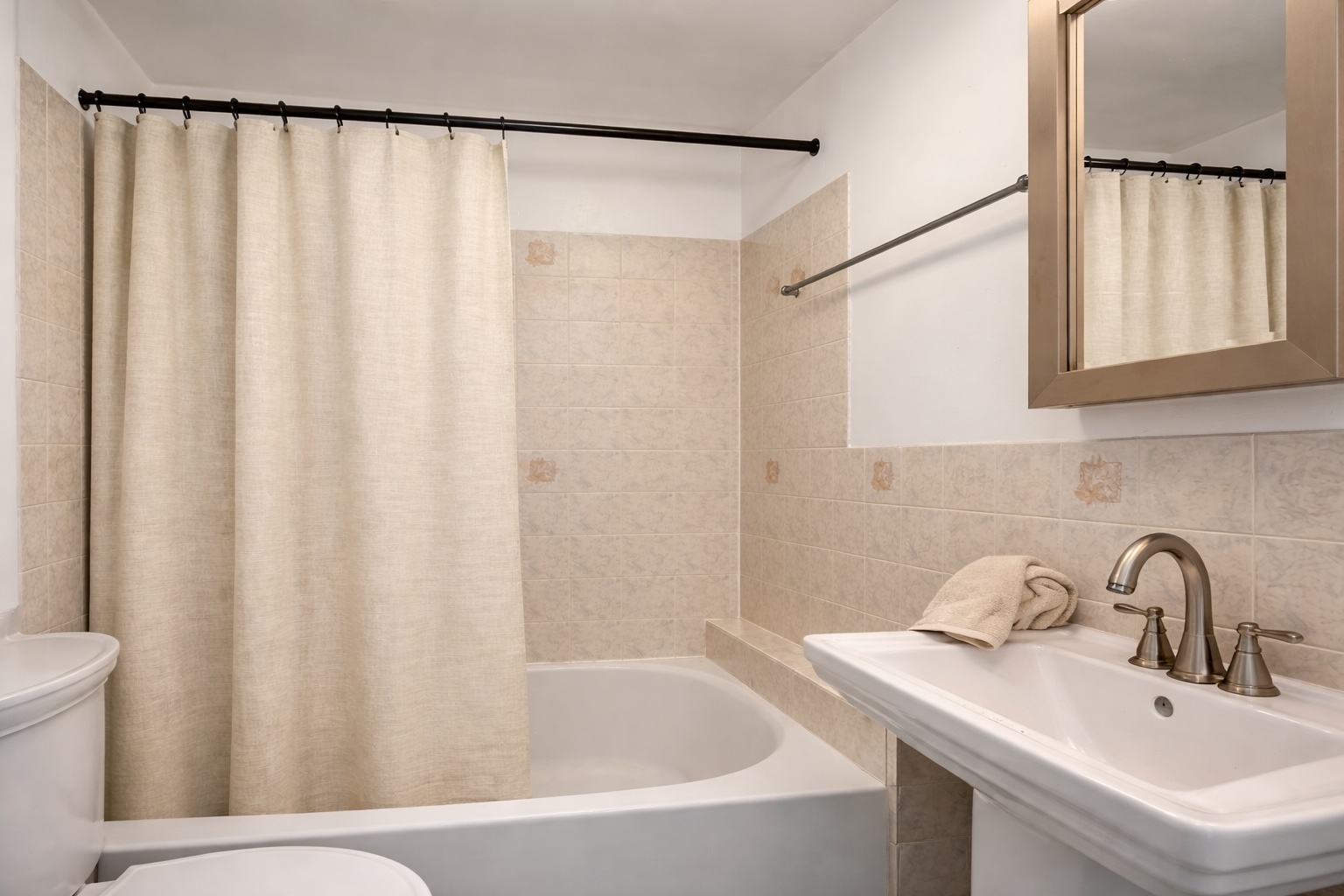 1100 Lincoln Place, Unit 1 Brooklyn, NY 11213 - Photo 4 of 8 a bathroom with a sink and a bathtub