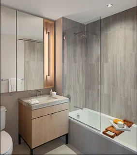 a bathroom with a walk in closet