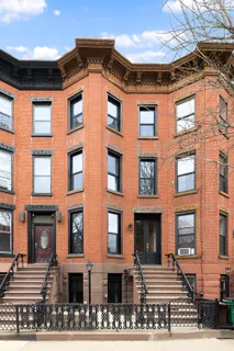 a front view of a multi story building