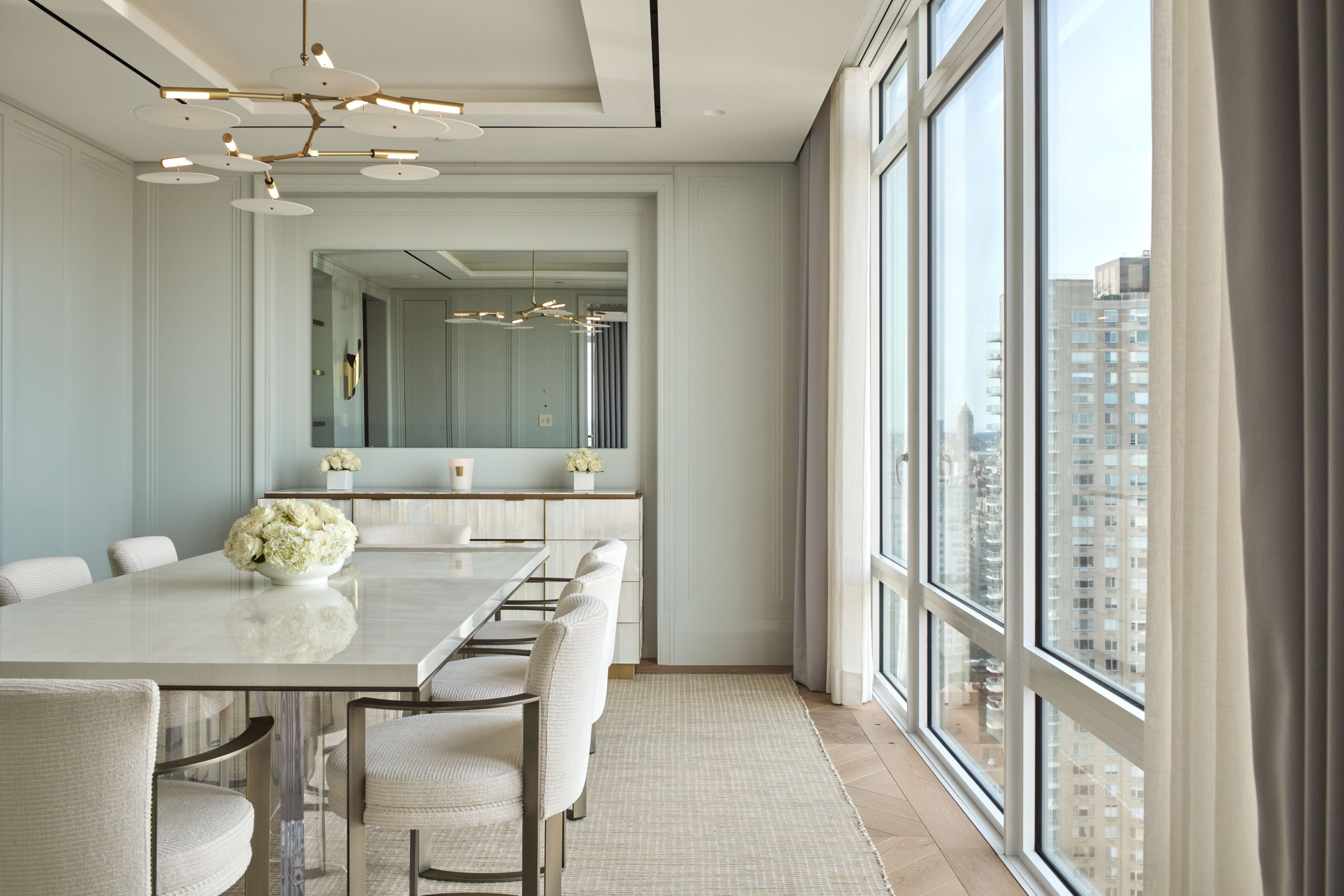 1355 1st Avenue, Unit PH2 Manhattan, NY 10021 - Photo 6 of 28 a view of a dining room with furniture window and outside view