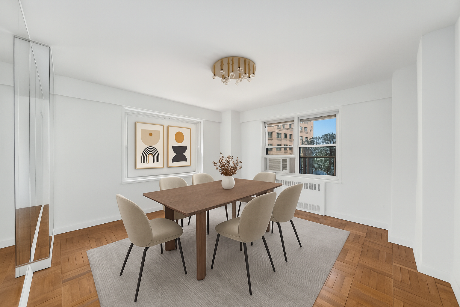 50 Sutton Place South, Unit 5E Manhattan, NY 10022 - Photo 4 of 13 a view of a dining room with furniture and wooden floor