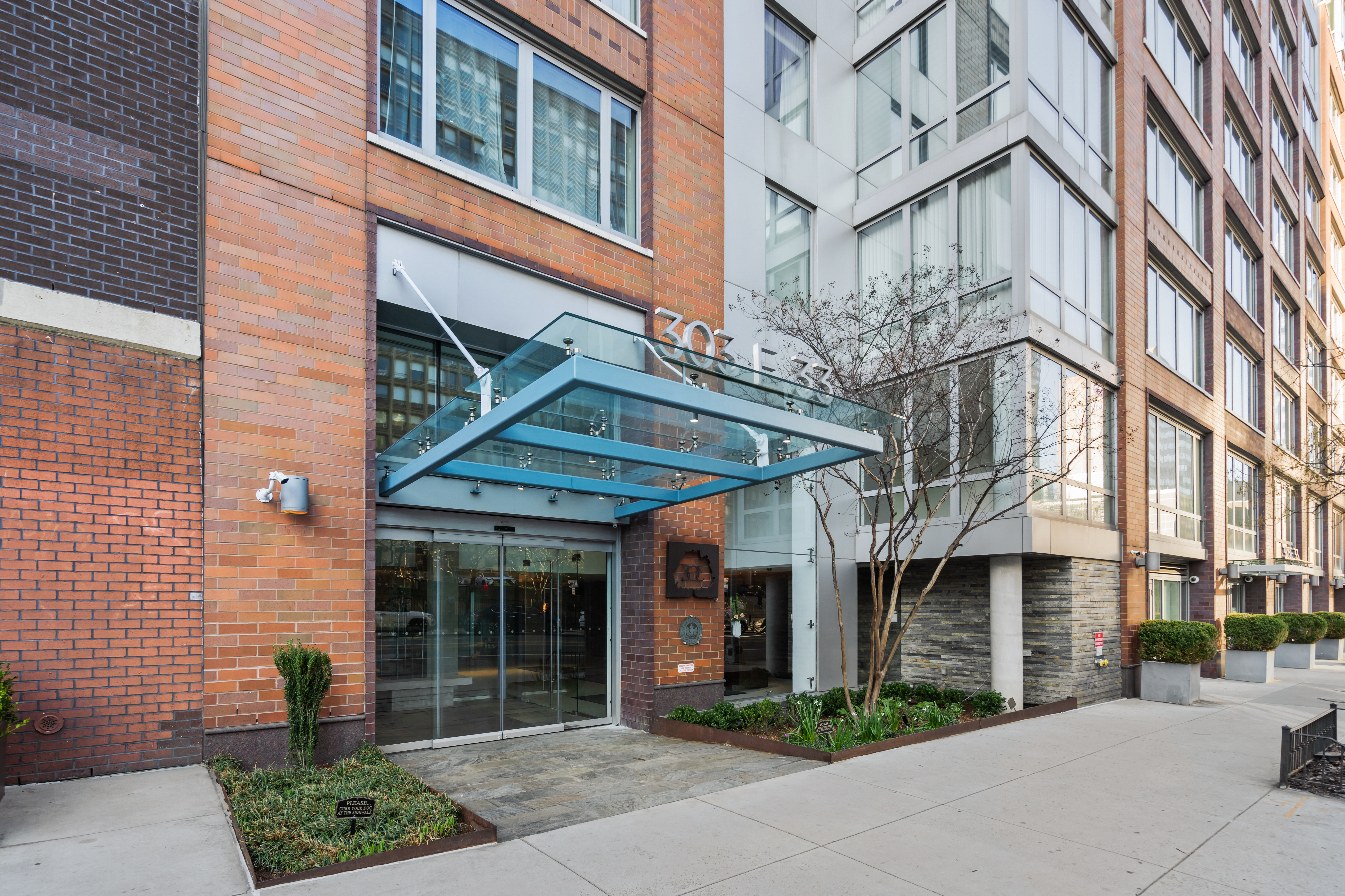 303 East 33rd Street, Unit 5H Manhattan, NY 10016 - Photo 9 of 18 front view of a building