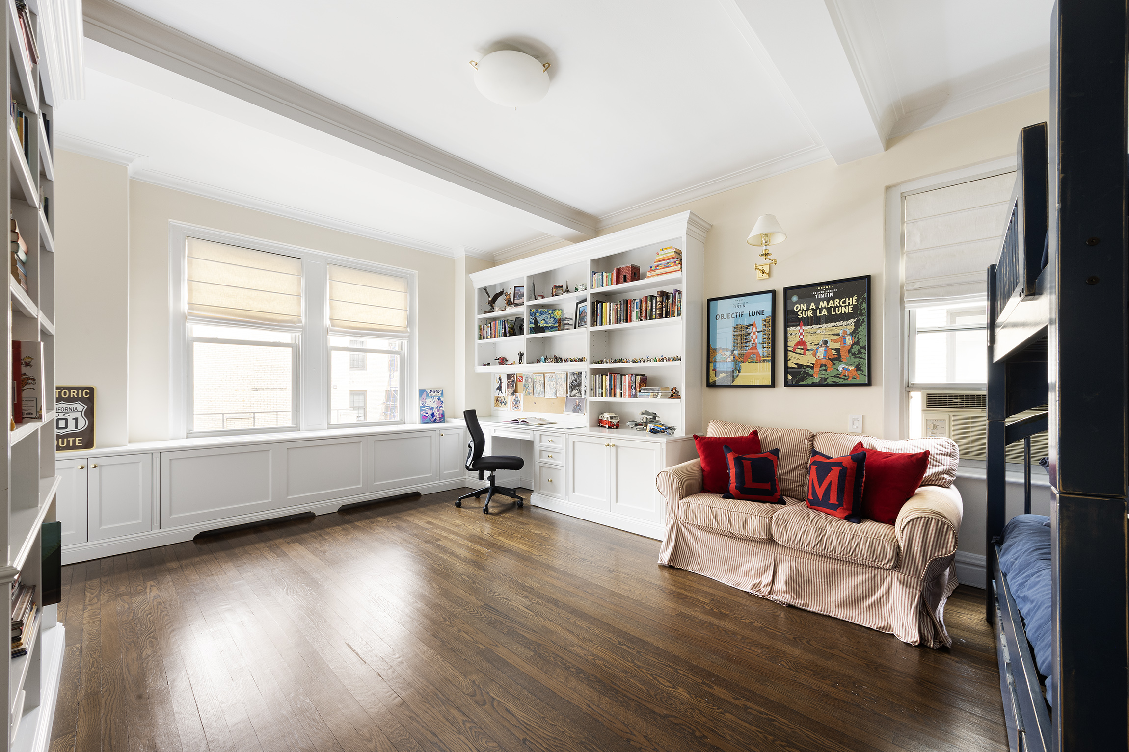 21 East 87th Street, Unit 10D Manhattan, NY 10128 - Photo 7 of 11 a living room with furniture and hard wood flooring