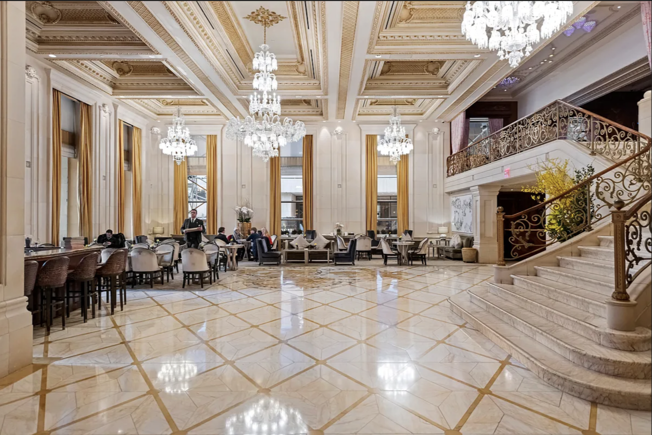 1 Central Park South, Unit 1126 Manhattan, NY 10019 - Photo 8 of 19 a view of a hall with many windows