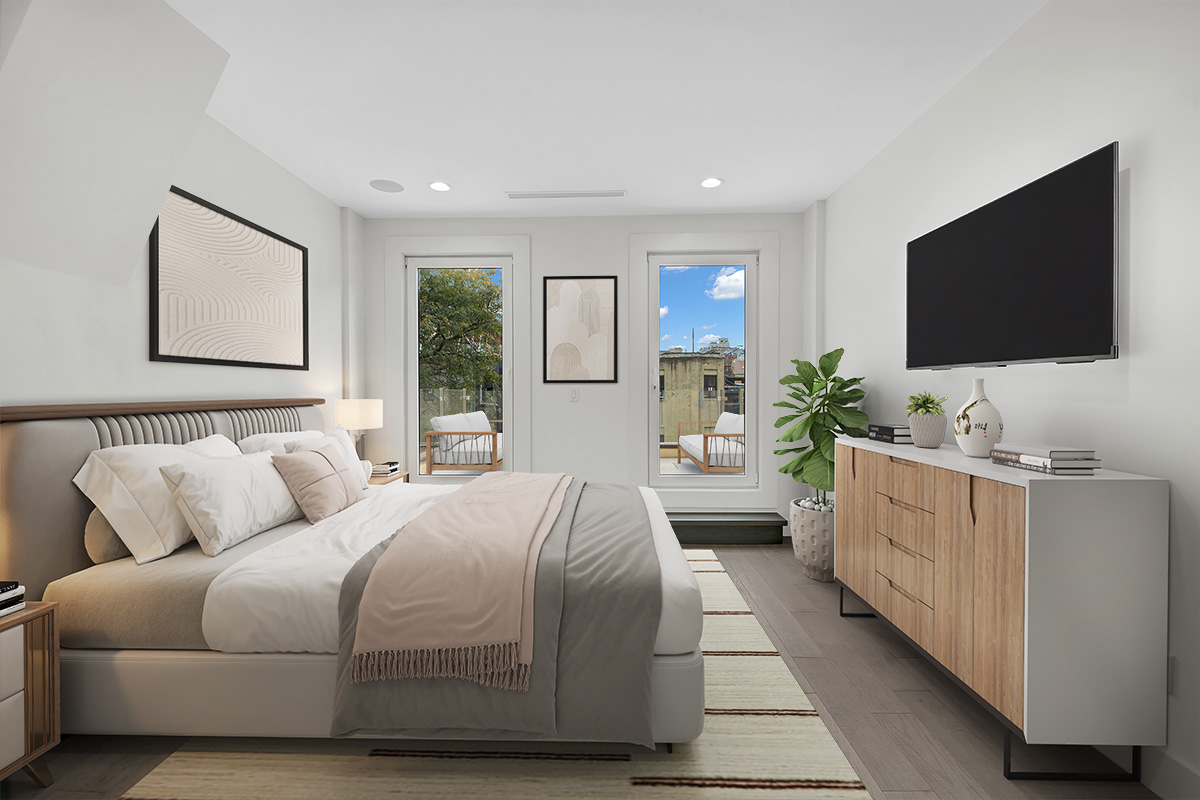 208 West 122nd Street Manhattan, NY 10027 - Photo 8 of 22 a bedroom with bed furniture and flat screen tv