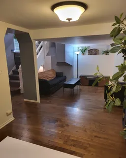 a view of kitchen and wooden floor