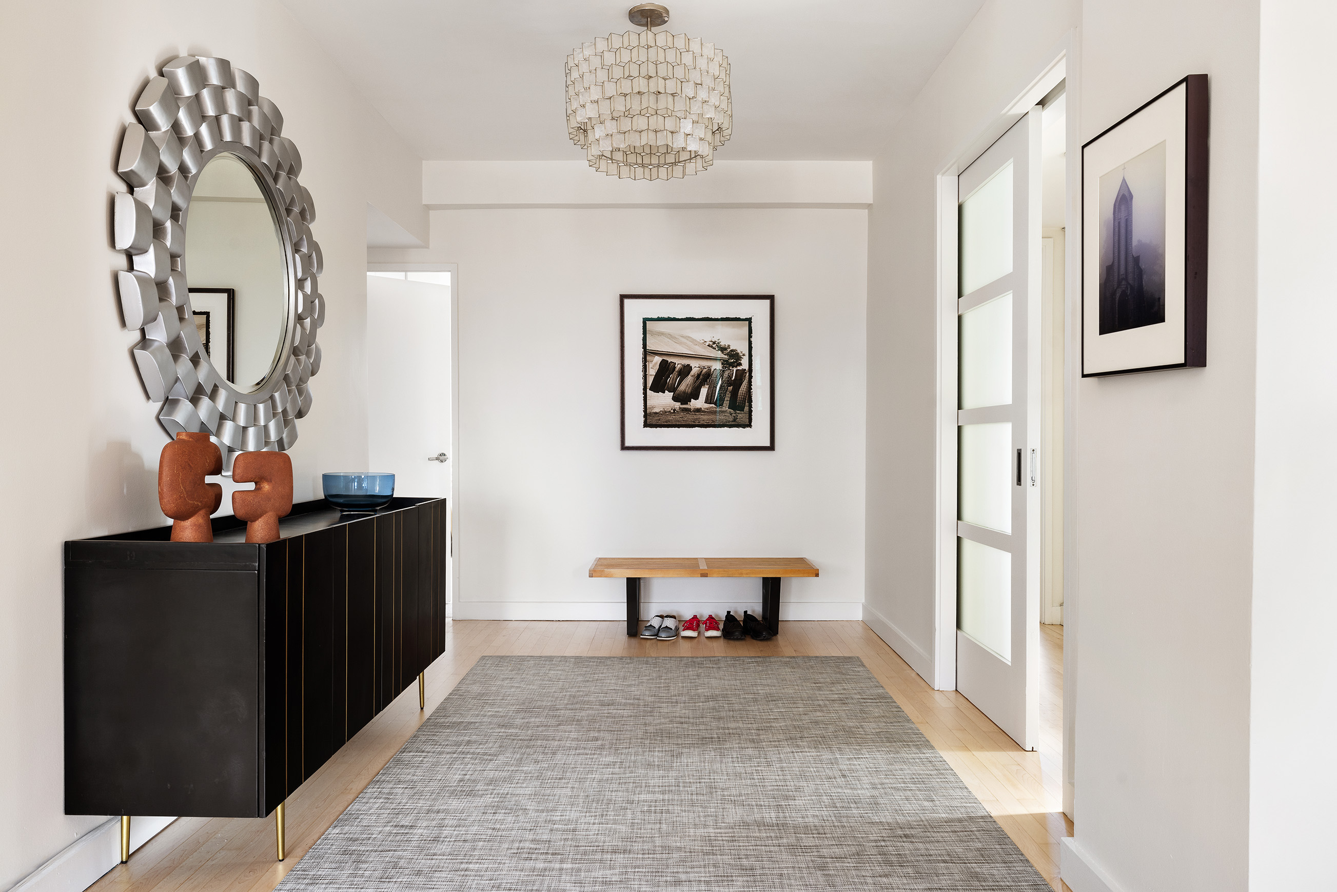 360 West 22nd Street, Unit 12B Manhattan, NY 10011 - Photo 10 of 16 a living room with furniture