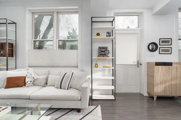 a living room with furniture and a window