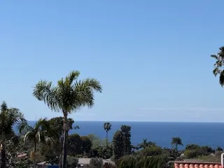 a view of ocean and sunset