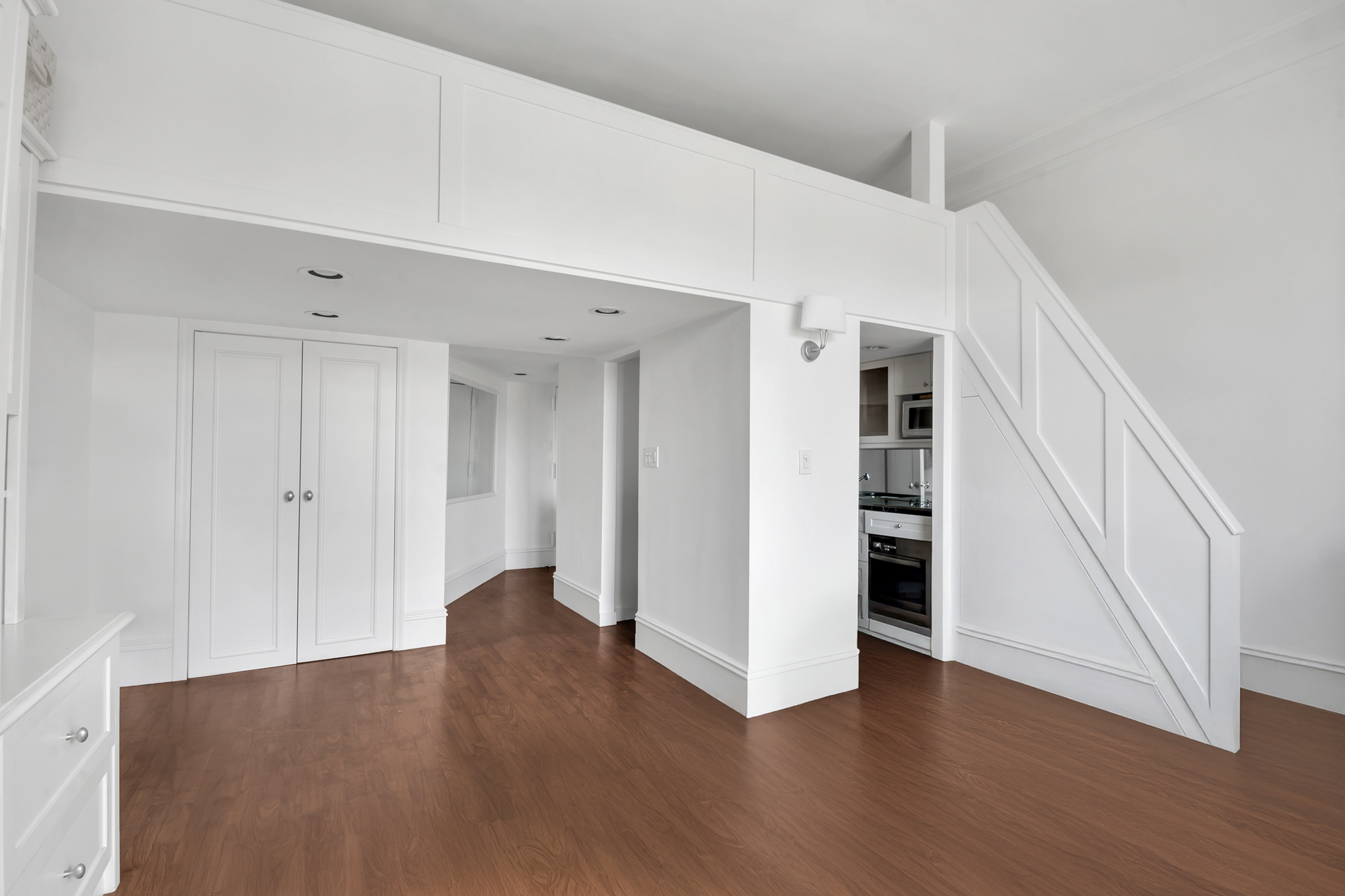 140 West 69th Street, Unit 107A Manhattan, NY 10023 - Photo 9 of 15 a view of entryway with wooden floor