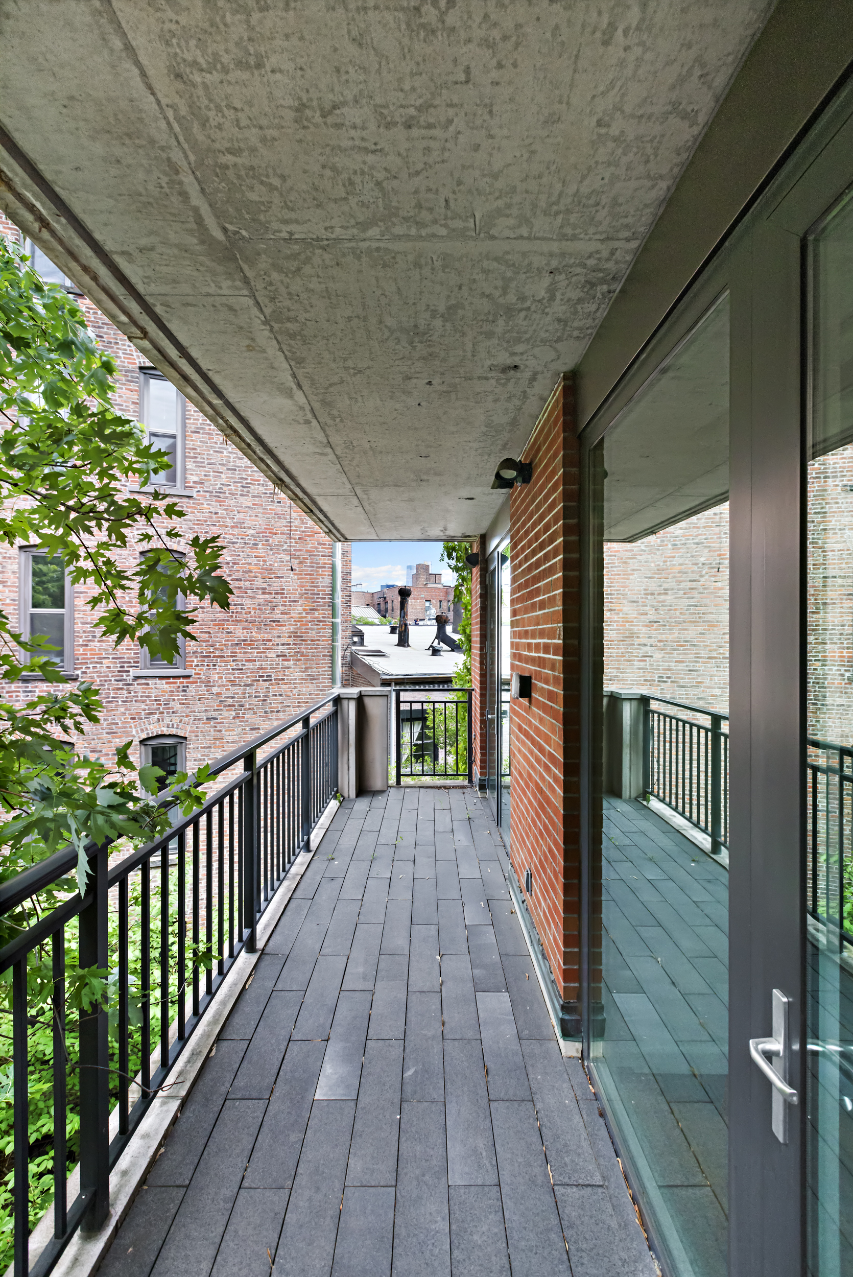 744 Greenwich Street, Unit 4 Manhattan, NY 10014 - Photo 26 of 34 a view of a balcony with wooden floor