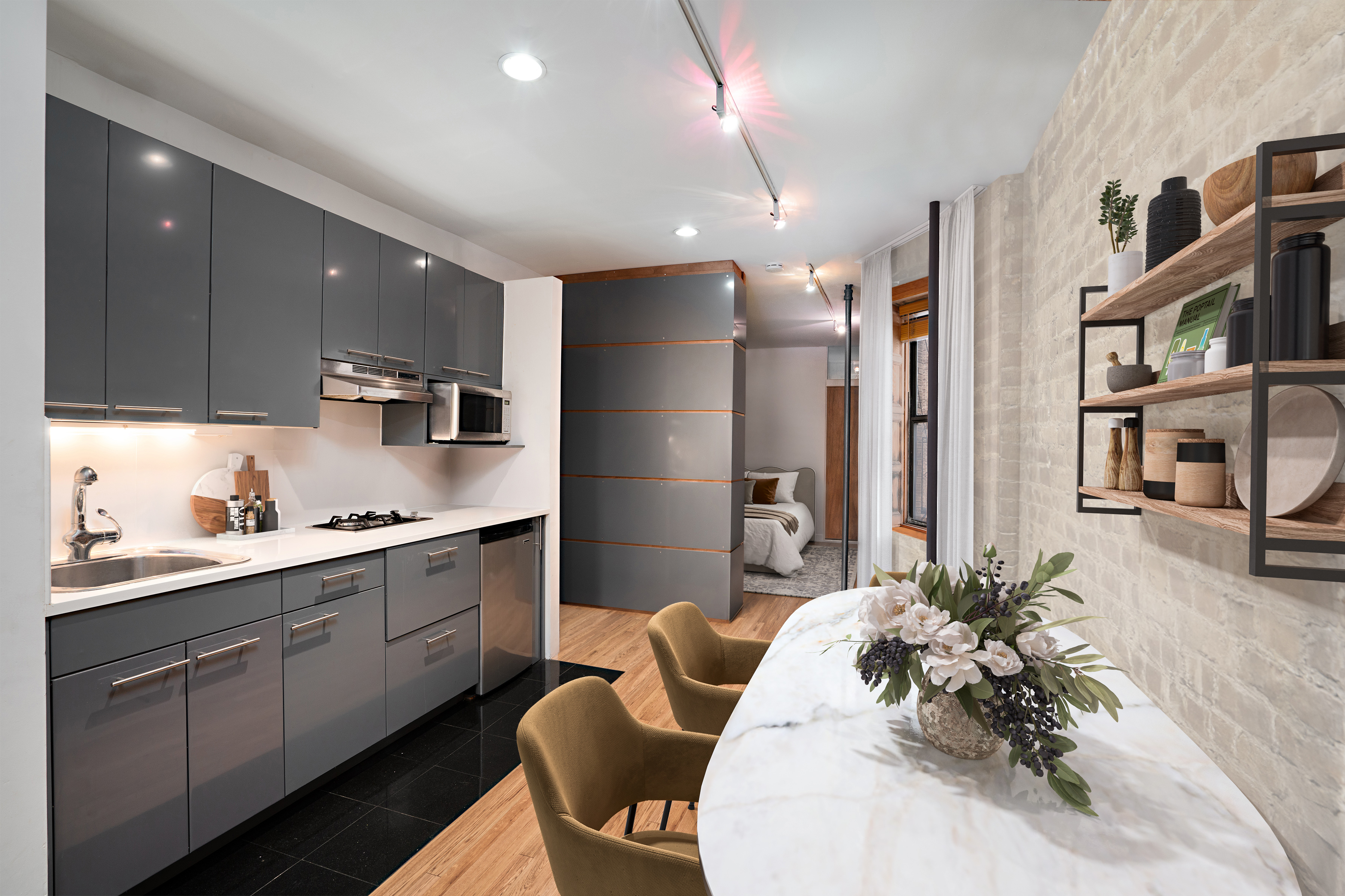 218 East 82nd Street, Unit 4FW Manhattan, NY 10028 - Photo 5 of 9 a kitchen with cabinets and chairs