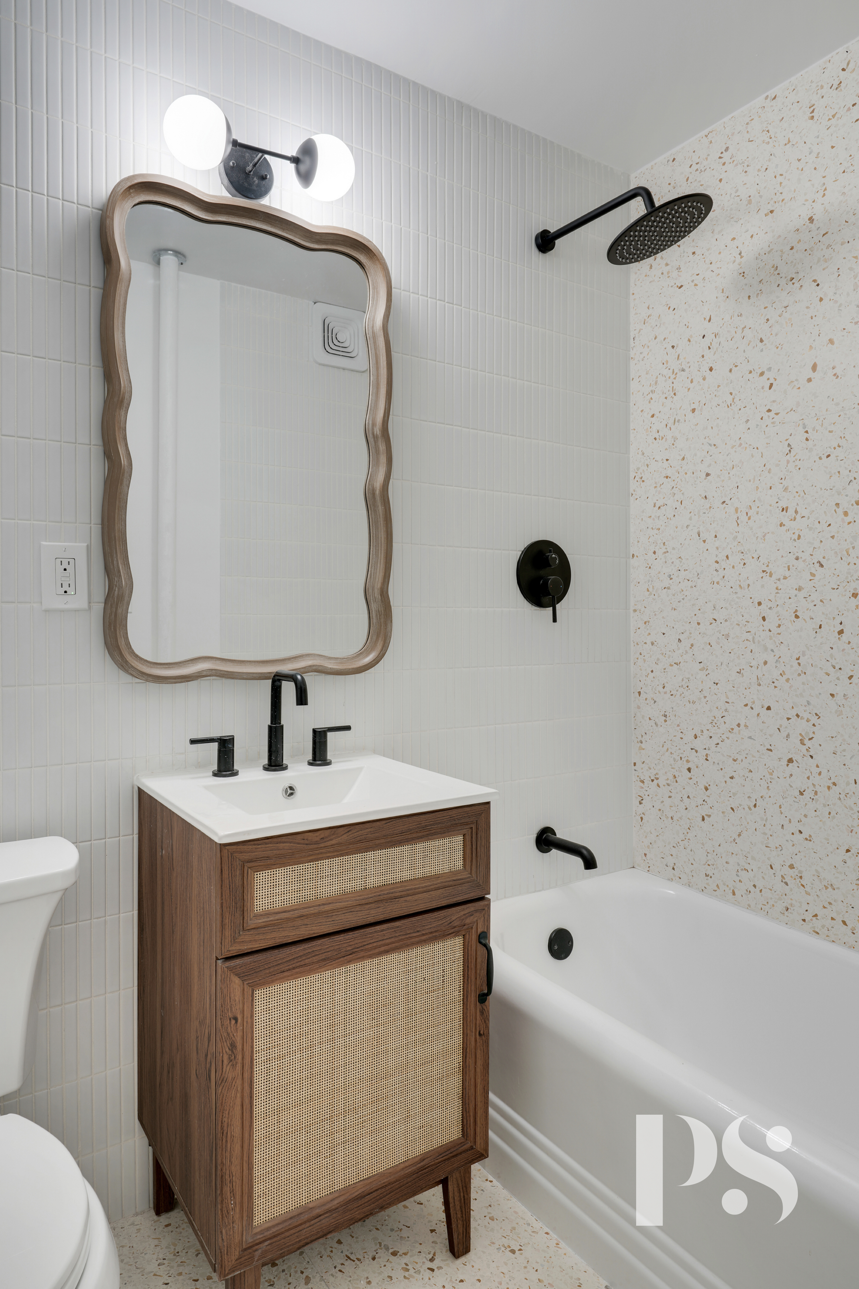 51 Jane Street, Unit 16 Manhattan, NY 10014 - Photo 4 of 6 a bathroom with a sink toilet and tub