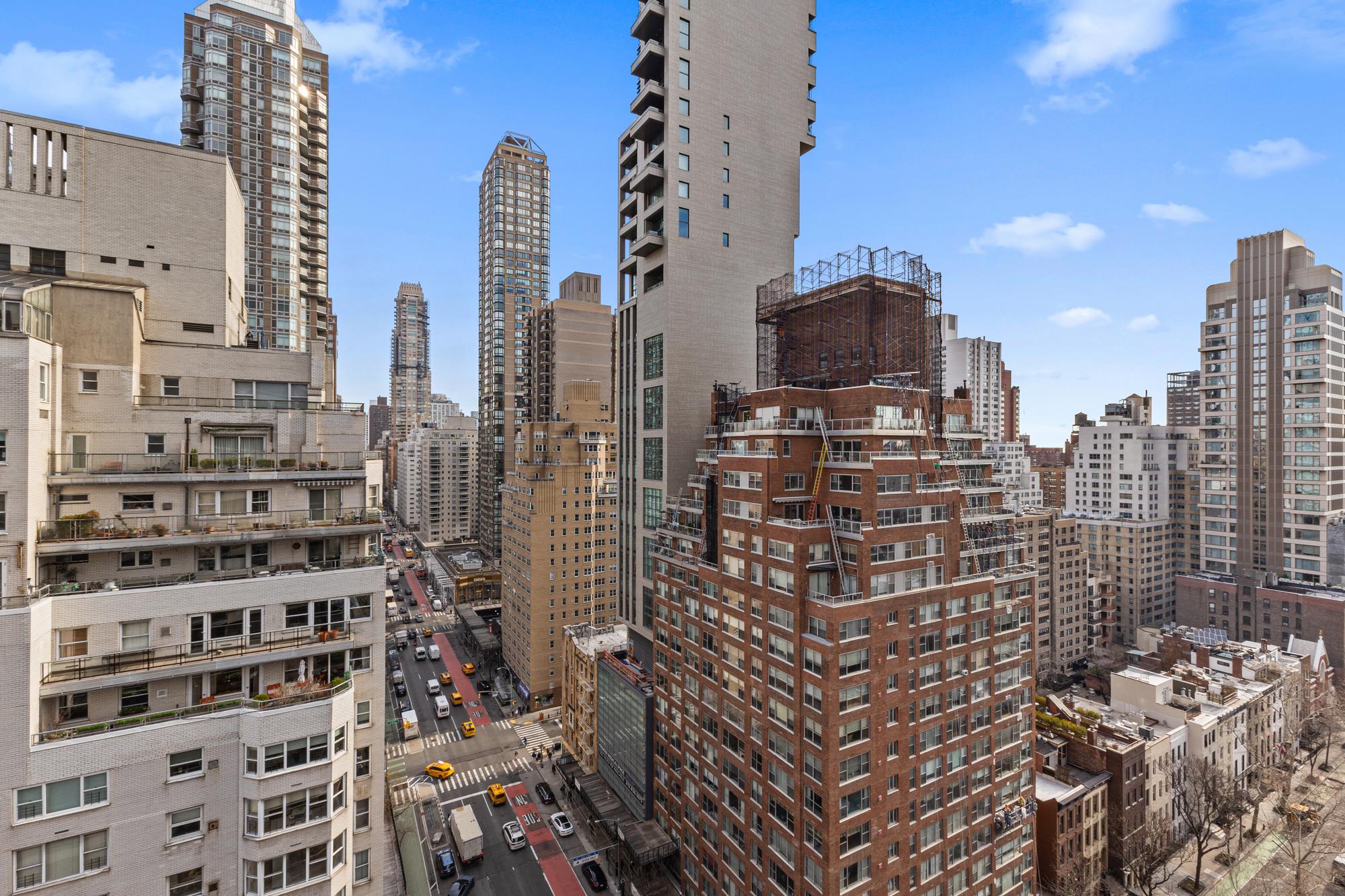 167 East 61st Street, Unit 20E Manhattan, NY 10065 - Photo 7 of 24 a city view with tall buildings