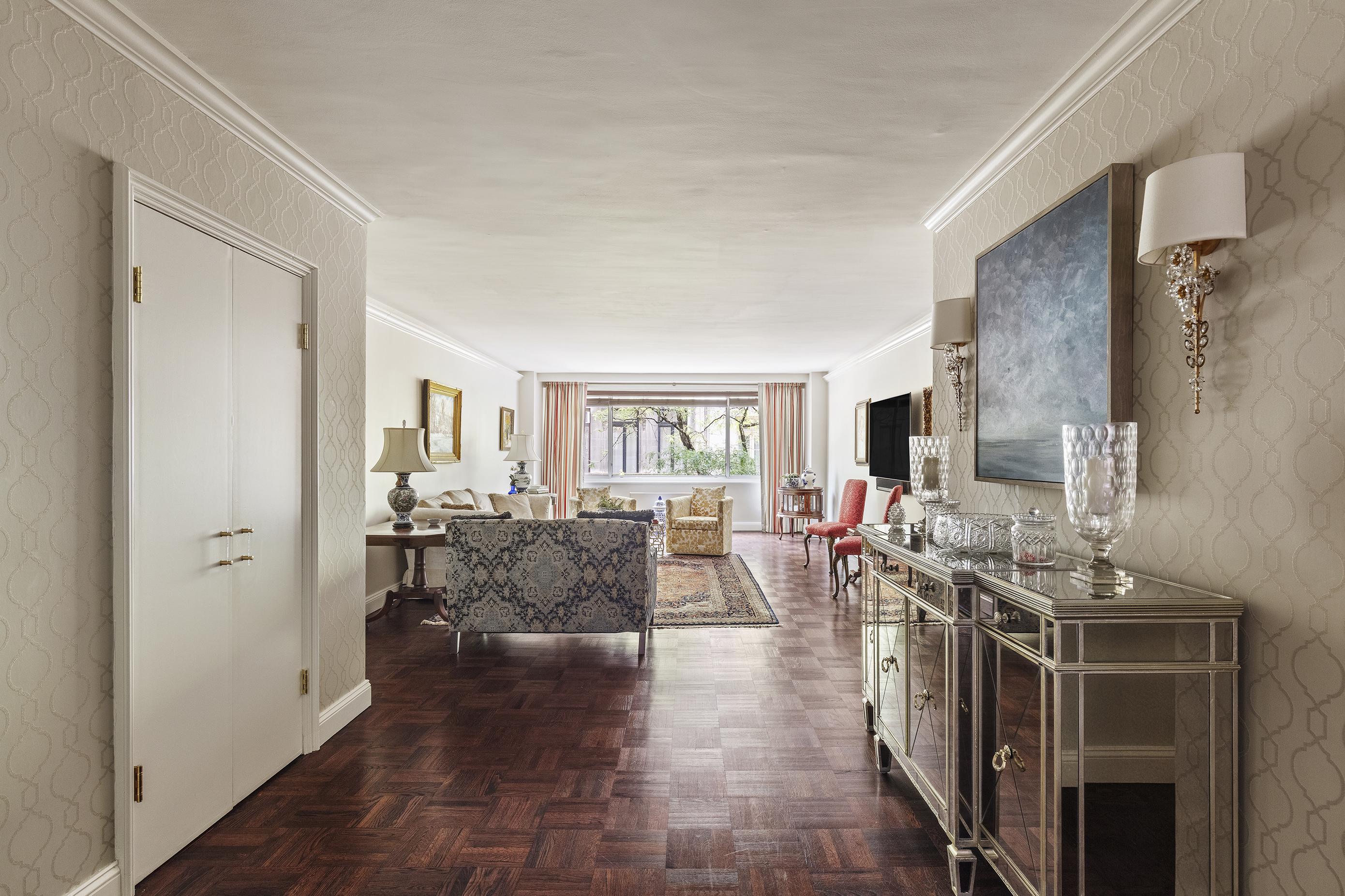10 East 70th Street, Unit 3A Manhattan, NY 10021 - Photo 2 of 18 a view of a living room and dining room