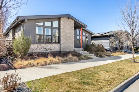 a front view of a house with swimming pool