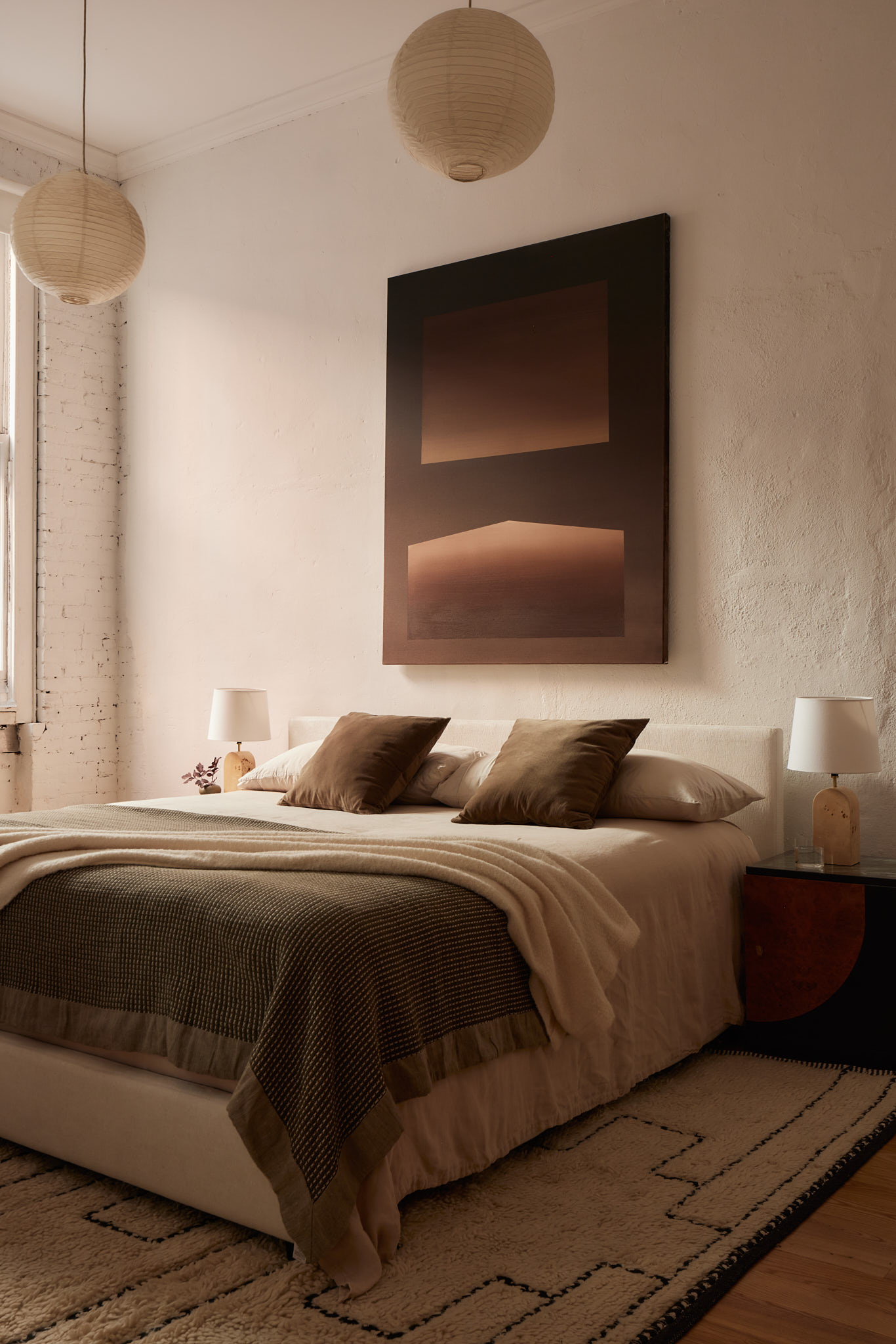 2 Bond Street, Unit 2 Manhattan, NY 10012 - Photo 11 of 16 a bedroom with a bed and a lamp