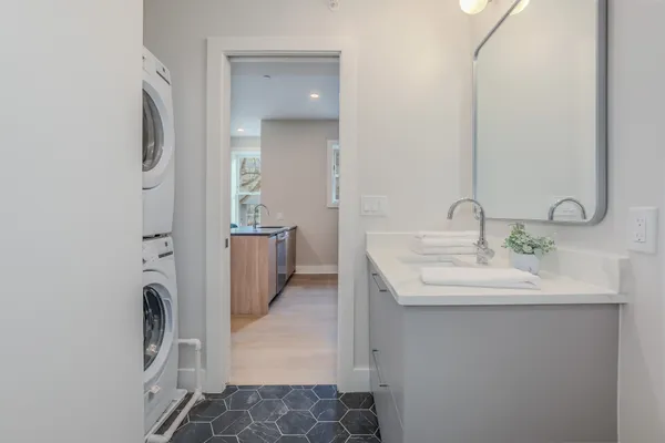 a en suite bathroom with a sink a mirror and a shower