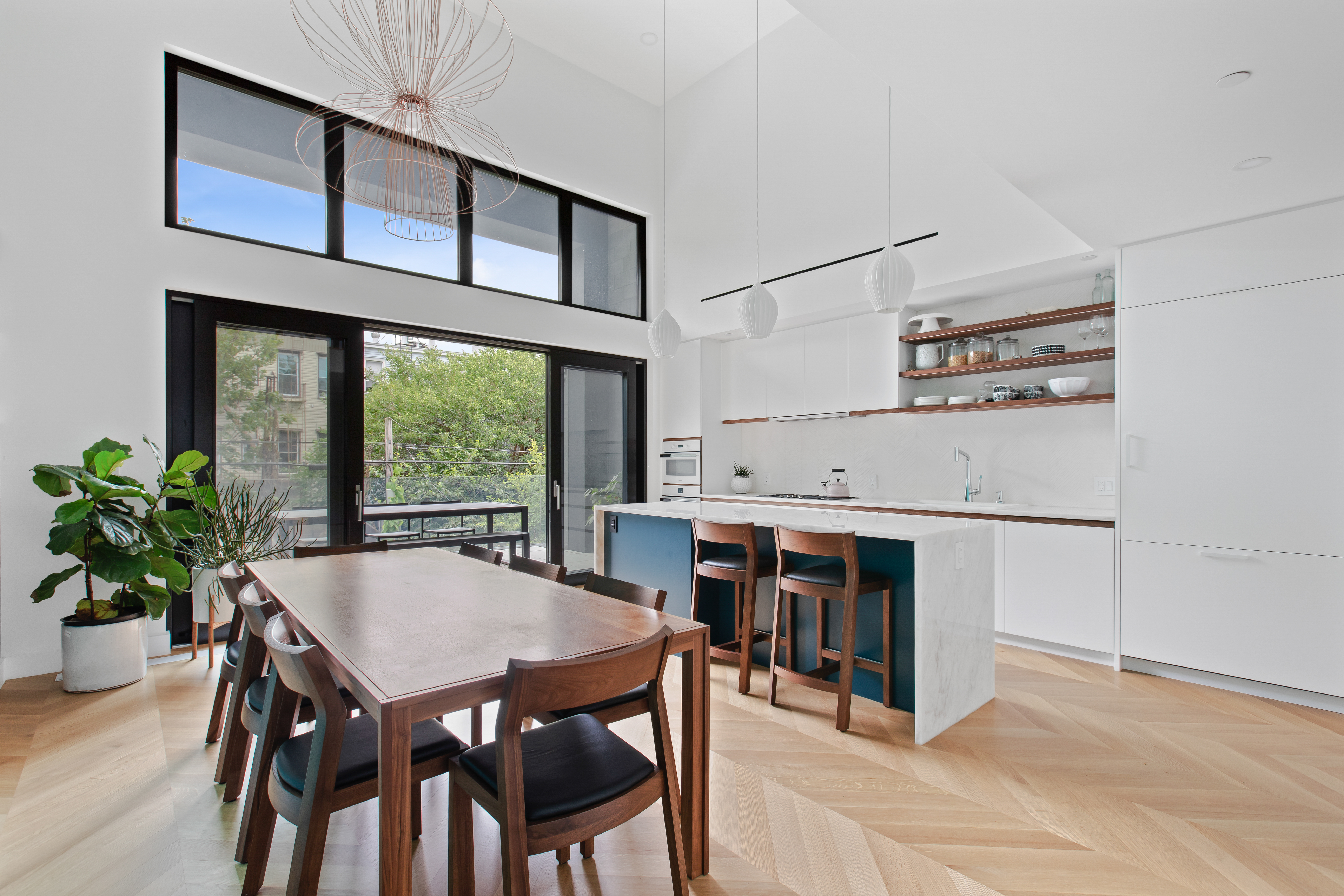 42 Sharon Street Brooklyn, NY 11211 - Photo 3 of 28 a view of a dining room with furniture window and wooden floor