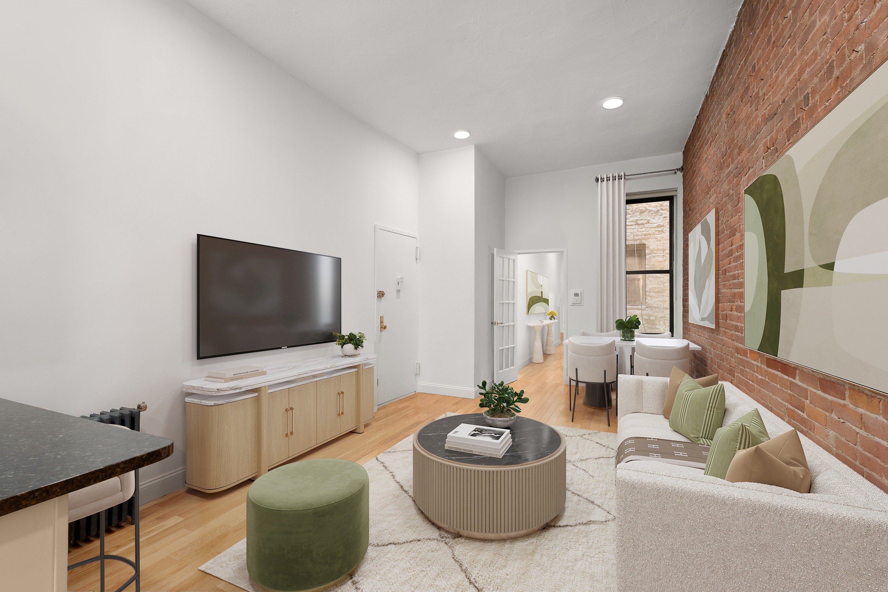 227 East 87th Street, Unit C Manhattan, NY 10128 - Photo 3 of 8 a living room with furniture and a flat screen tv