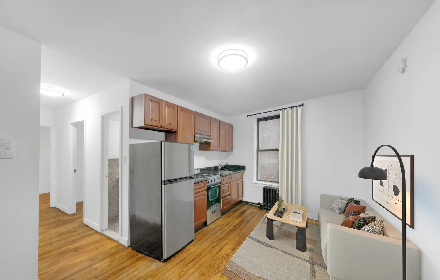 a kitchen with stainless steel appliances a refrigerator and a stove