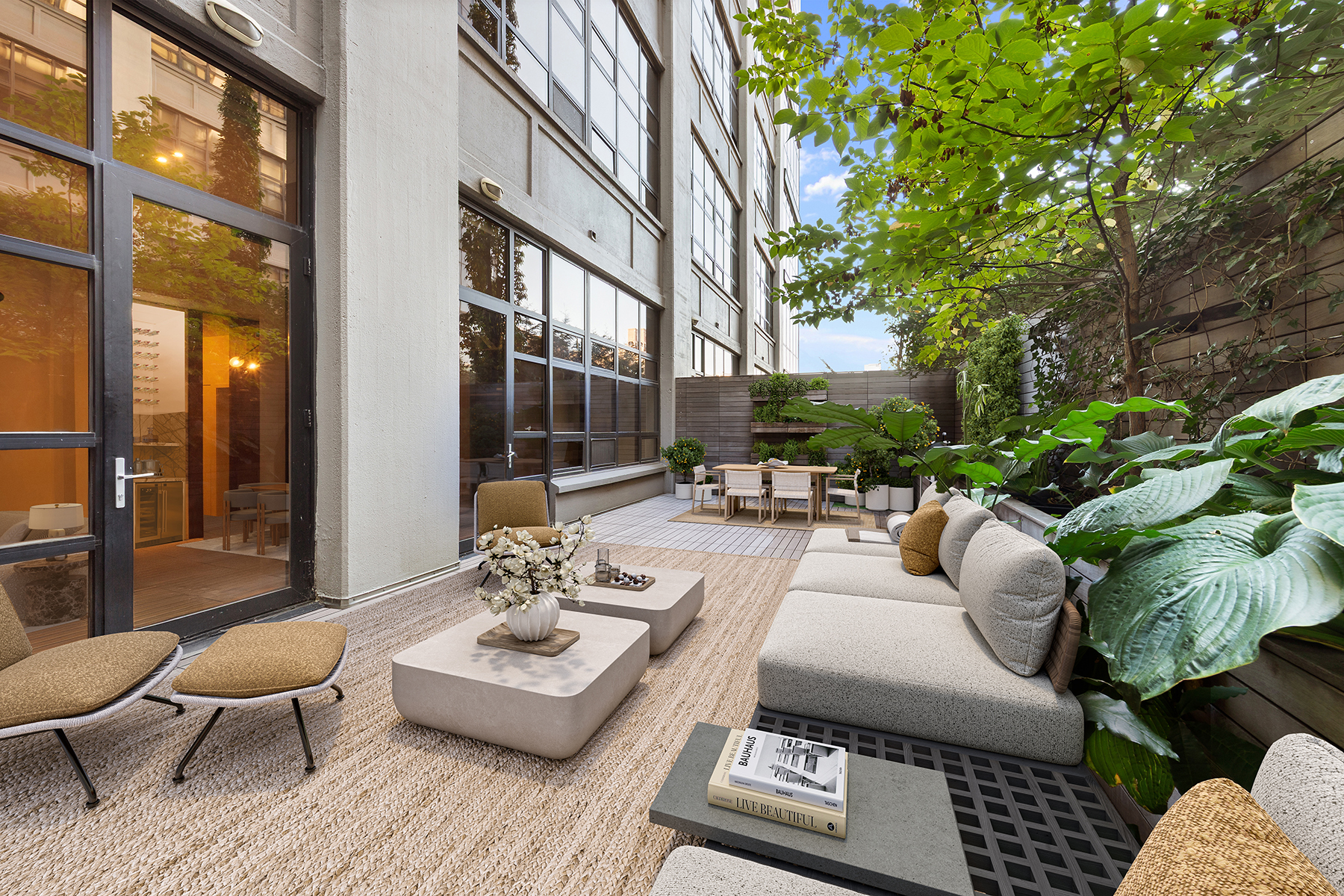 360 Furman Street, Unit 322/323 Brooklyn, NY 11201 - Photo 3 of 42 a outdoor space with patio the couches and a potted plant on a table