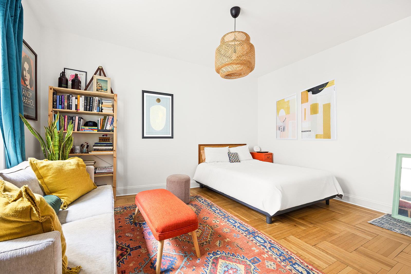 125 Eastern Parkway, Unit 3A Brooklyn, NY 11238 - Photo 6 of 15 a bedroom with furniture and a book shelf