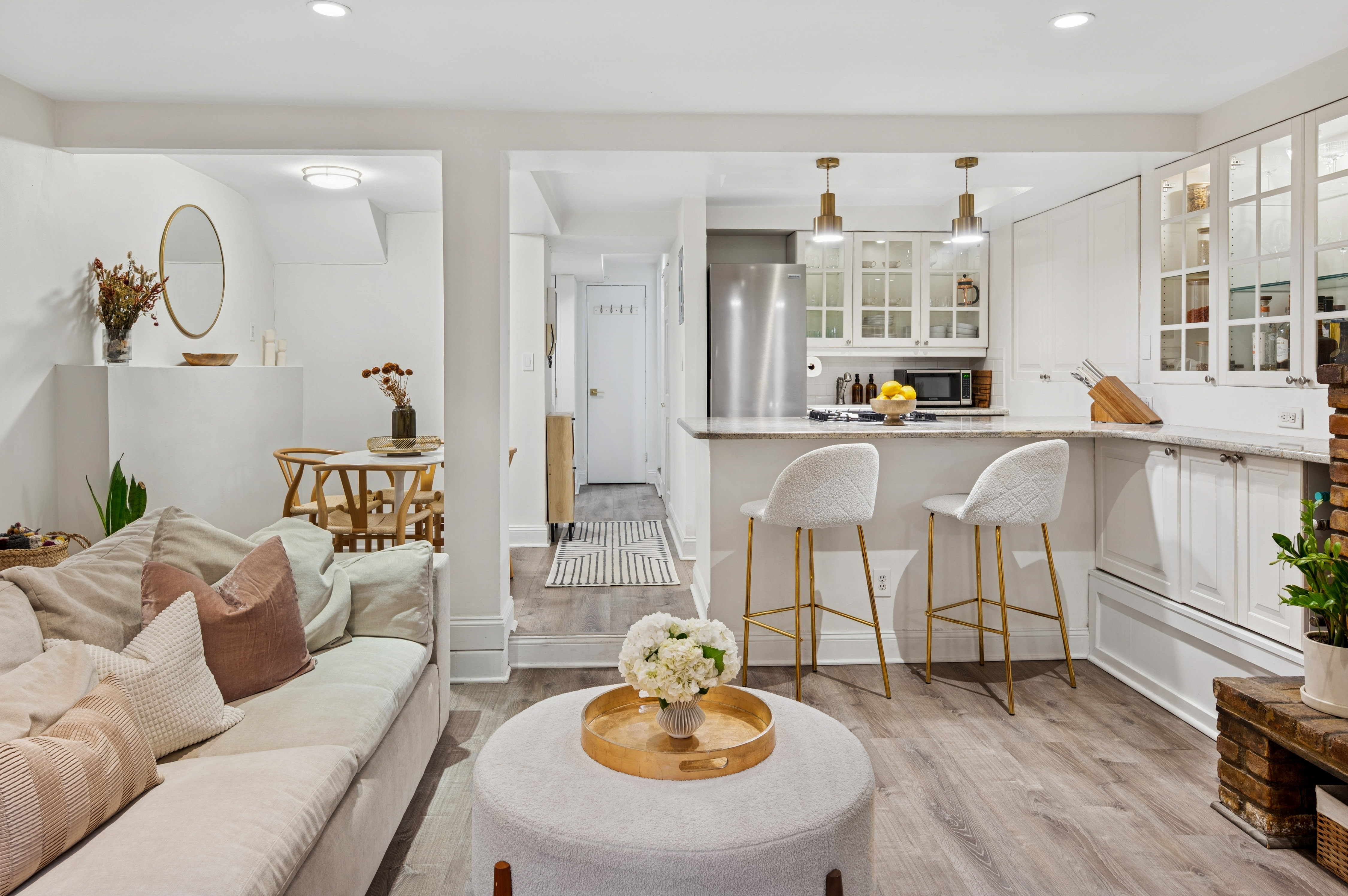 118 West 81st Street, Unit G Manhattan, NY 10024 - Photo 5 of 18 a living room with furniture and a wooden floor