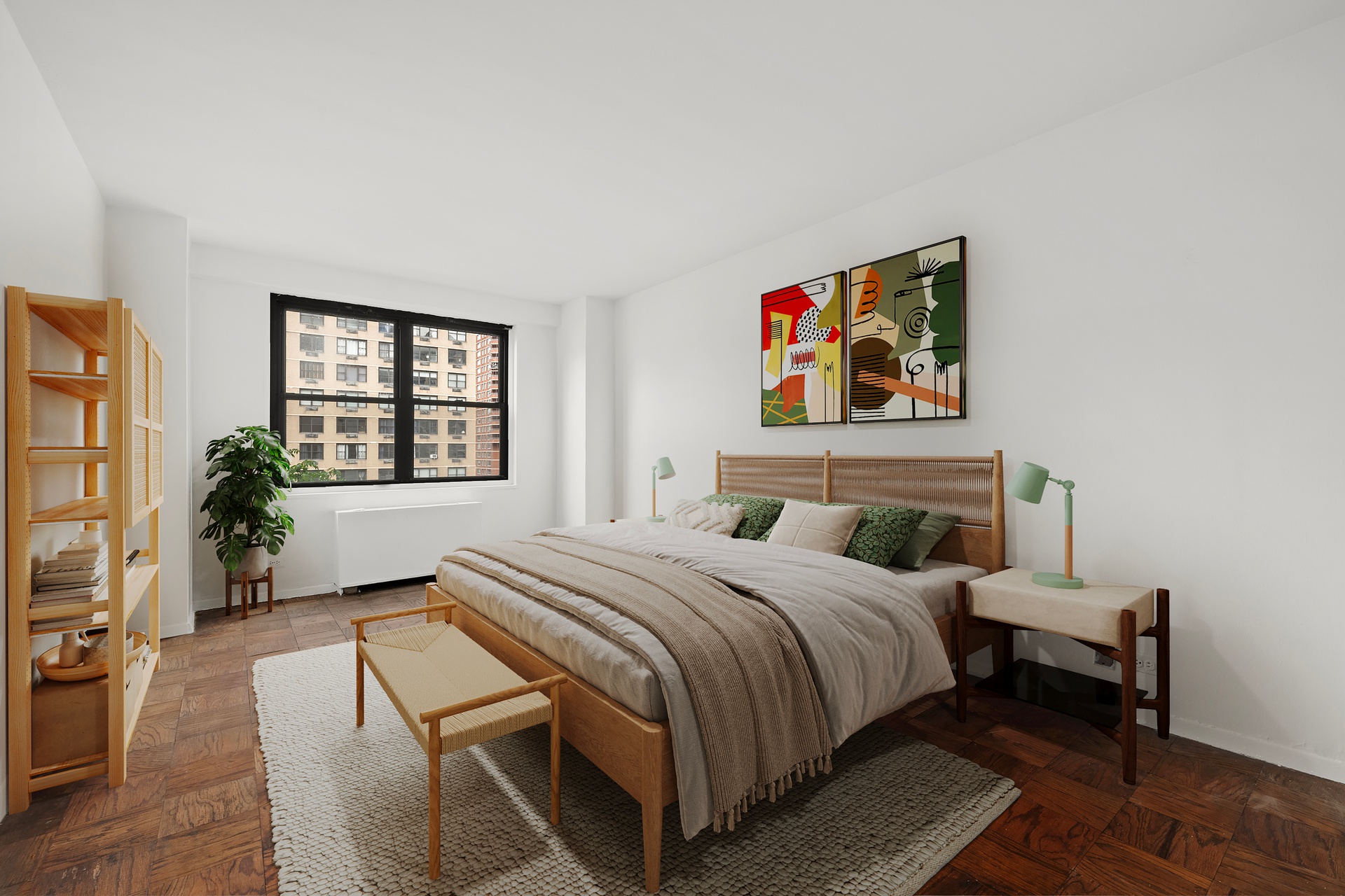 245 East 25th Street, Unit 8K Manhattan, NY 10010 - Photo 4 of 7 a bedroom with a bed and a couch