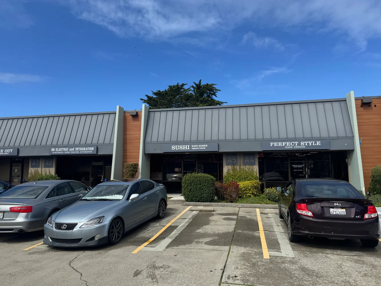 a view of cars parked in a parking lot