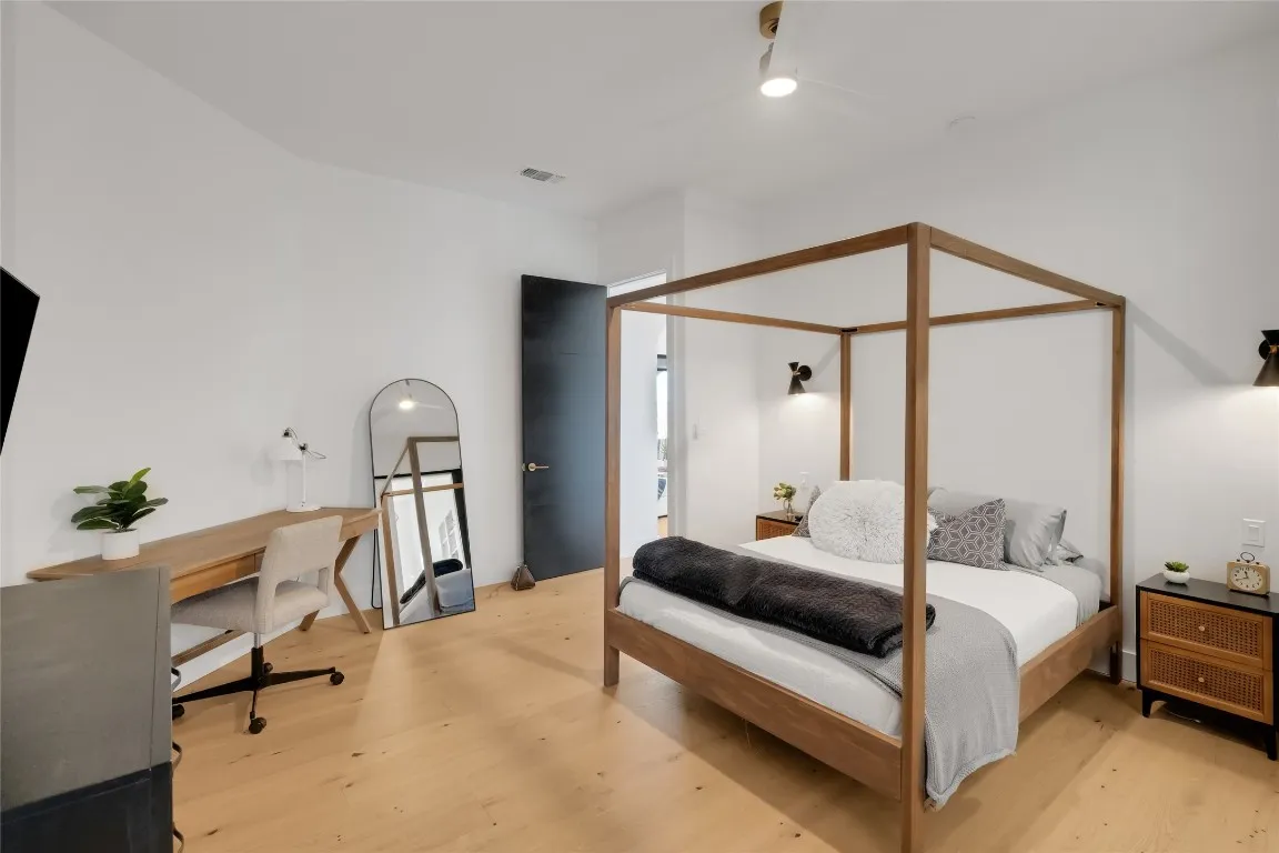 a bathroom with a toilet sink a shower and mirror