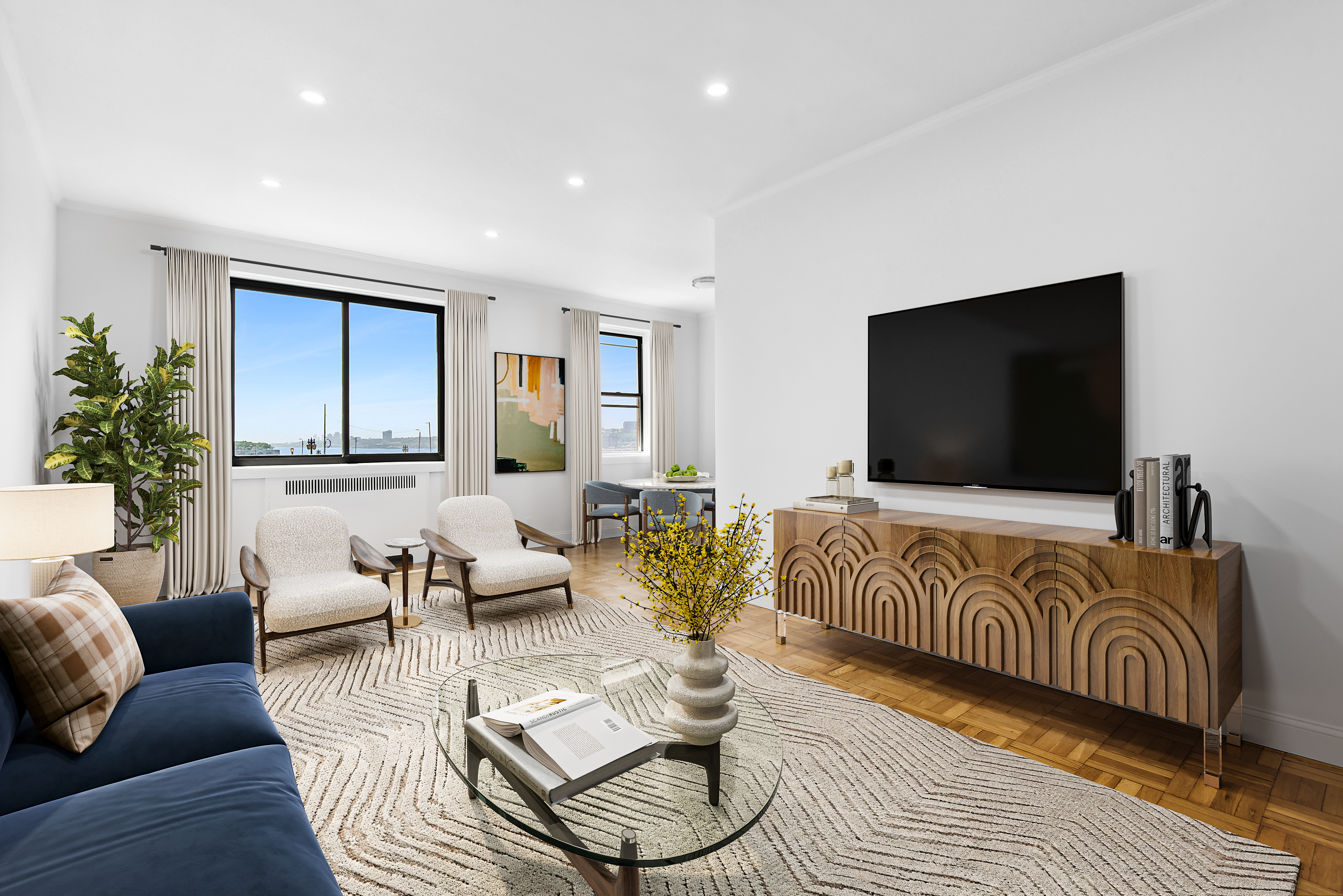 a living room with furniture and a flat screen tv