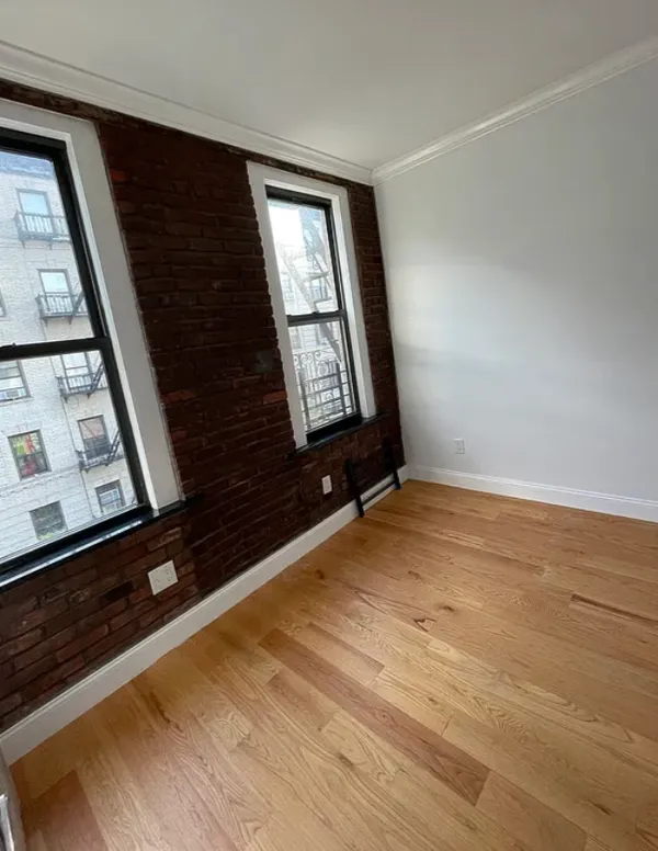 a view of an empty room and window