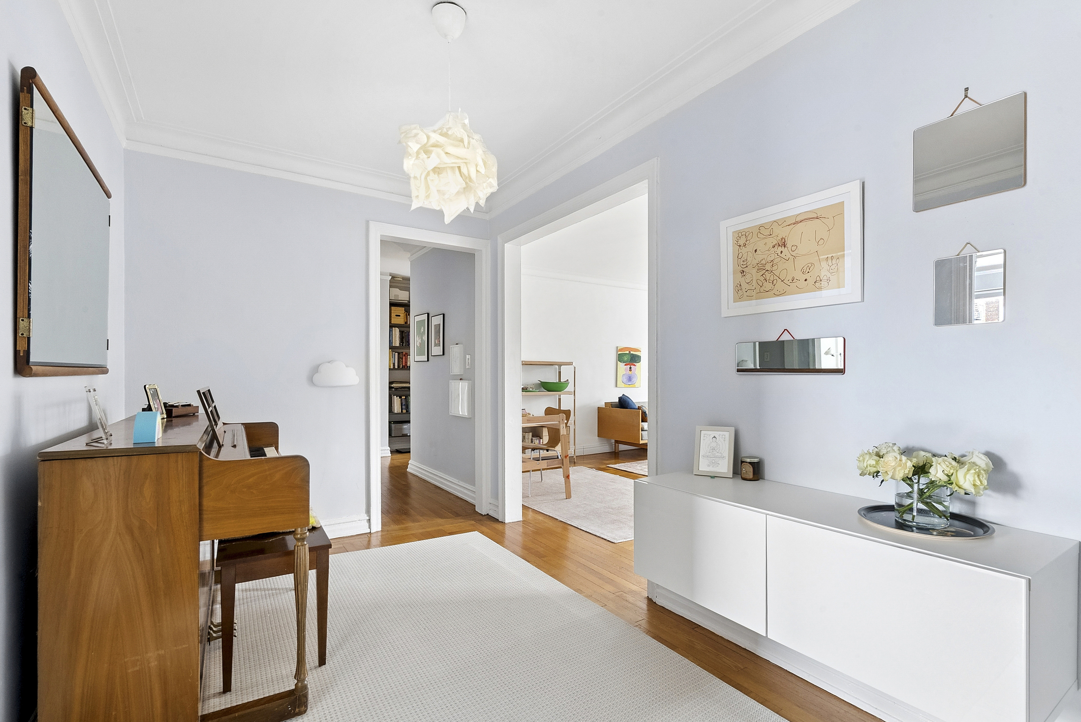 474 West 238th Street, Unit 2E Bronx, NY 10463 - Photo 3 of 13 a living room with furniture and a large window