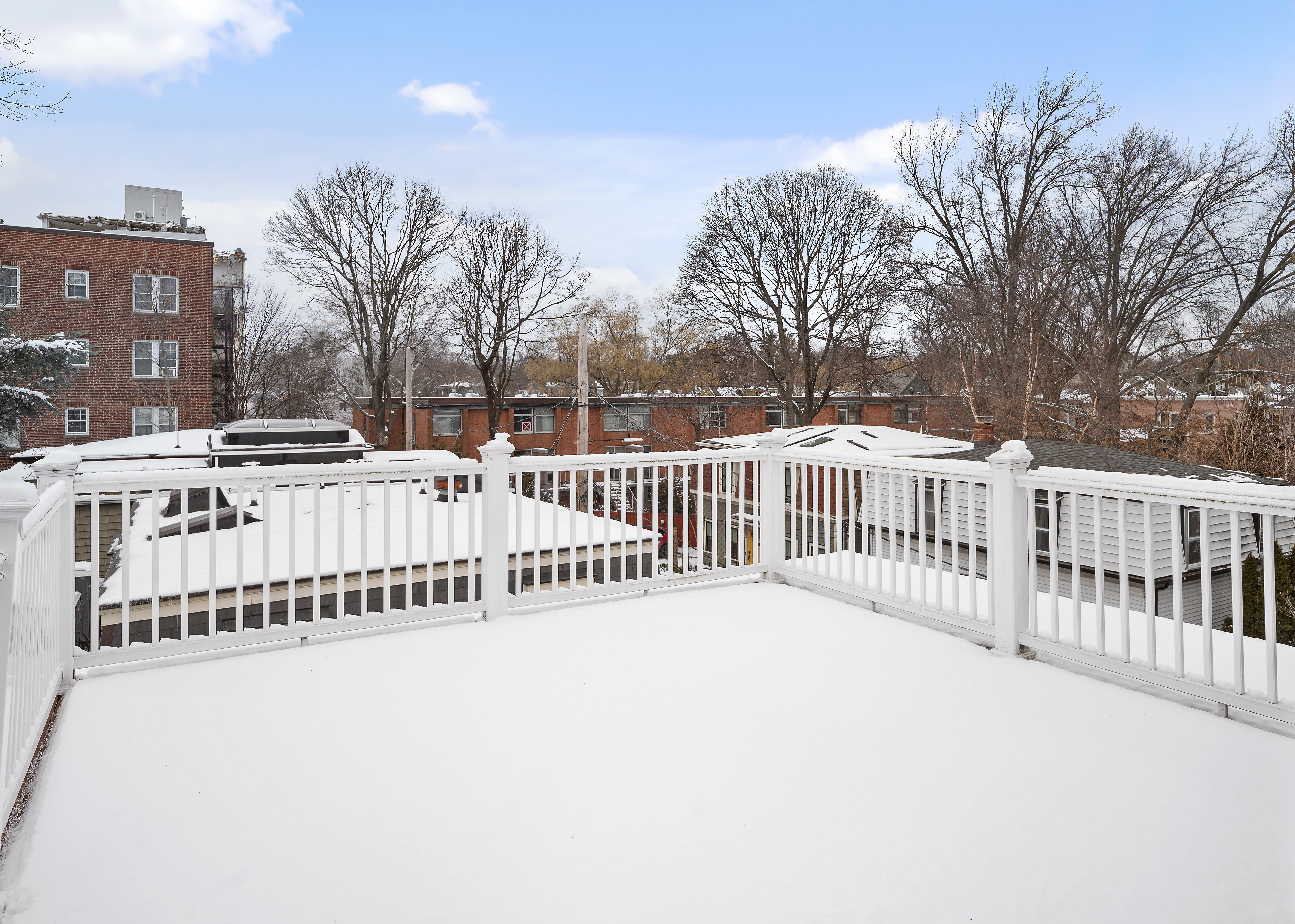 35 Willard Street Cambridge, MA 02138 - Photo 13 of 36 a view of a balcony with wooden fence