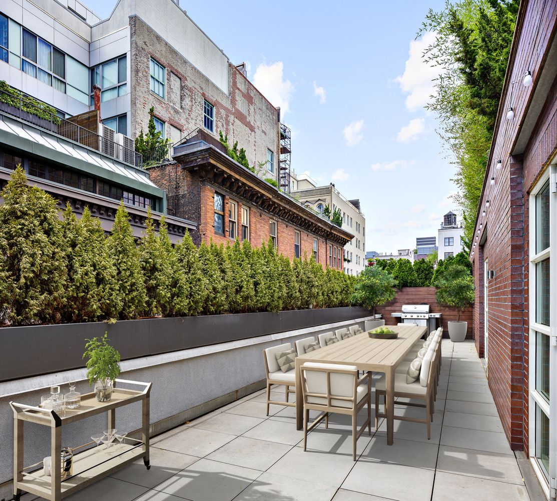 60 Collister Street, Unit 4A Manhattan, NY 10013 - Photo 8 of 21 a view of a patio with a table and chairs